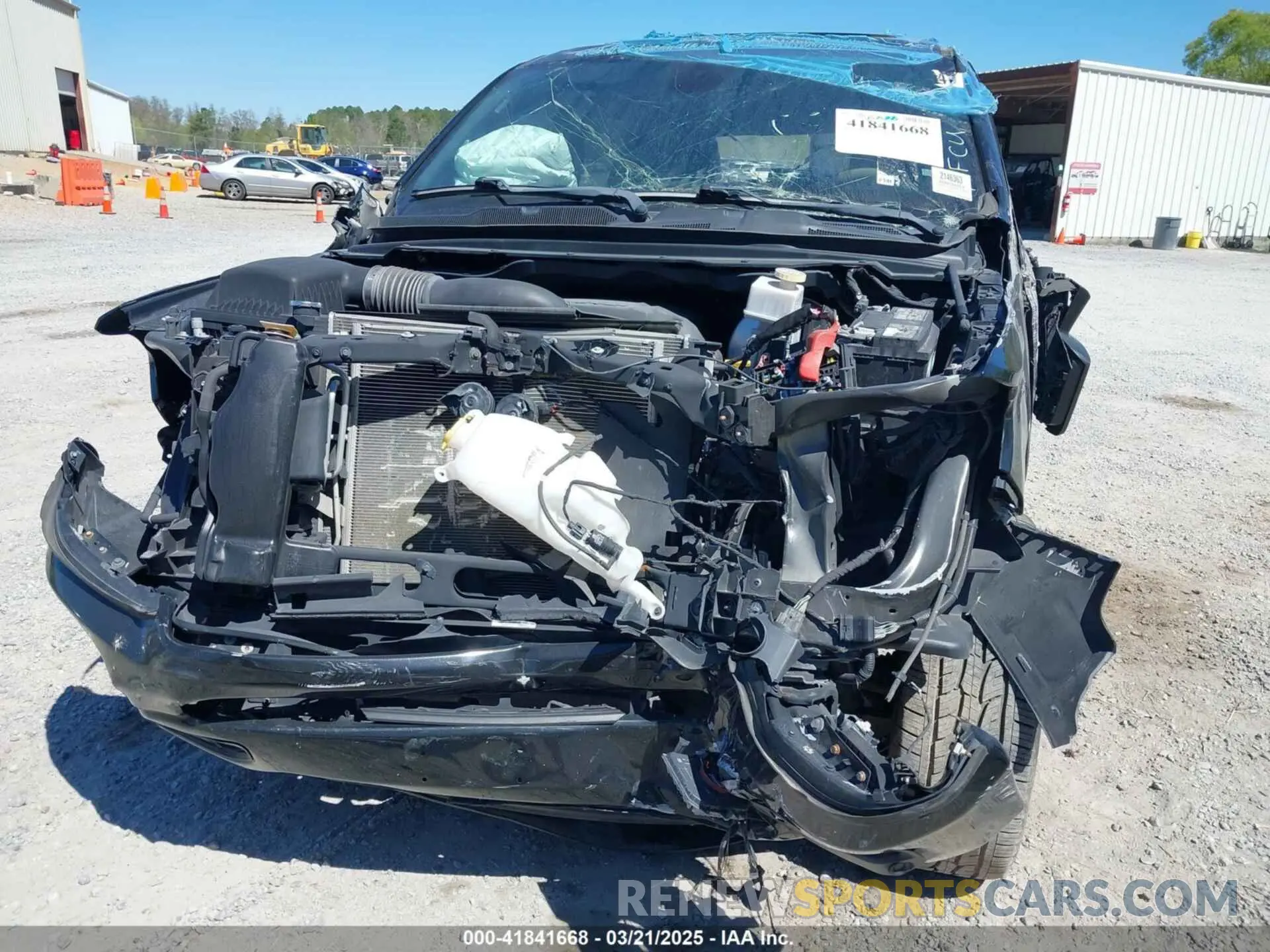 11 Photograph of a damaged car 1C6SRFFTXKN796983 RAM 1500 2019