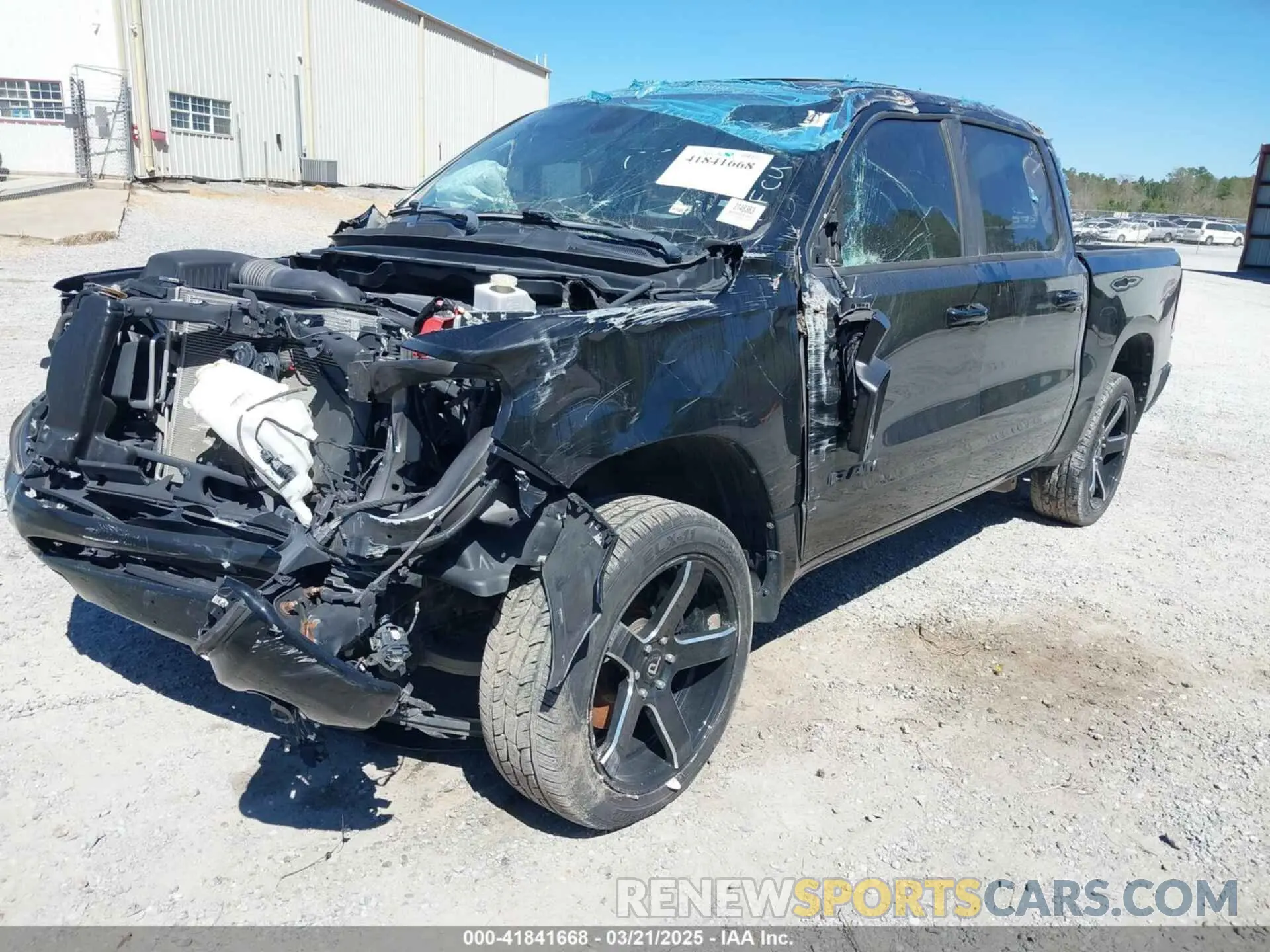2 Photograph of a damaged car 1C6SRFFTXKN796983 RAM 1500 2019