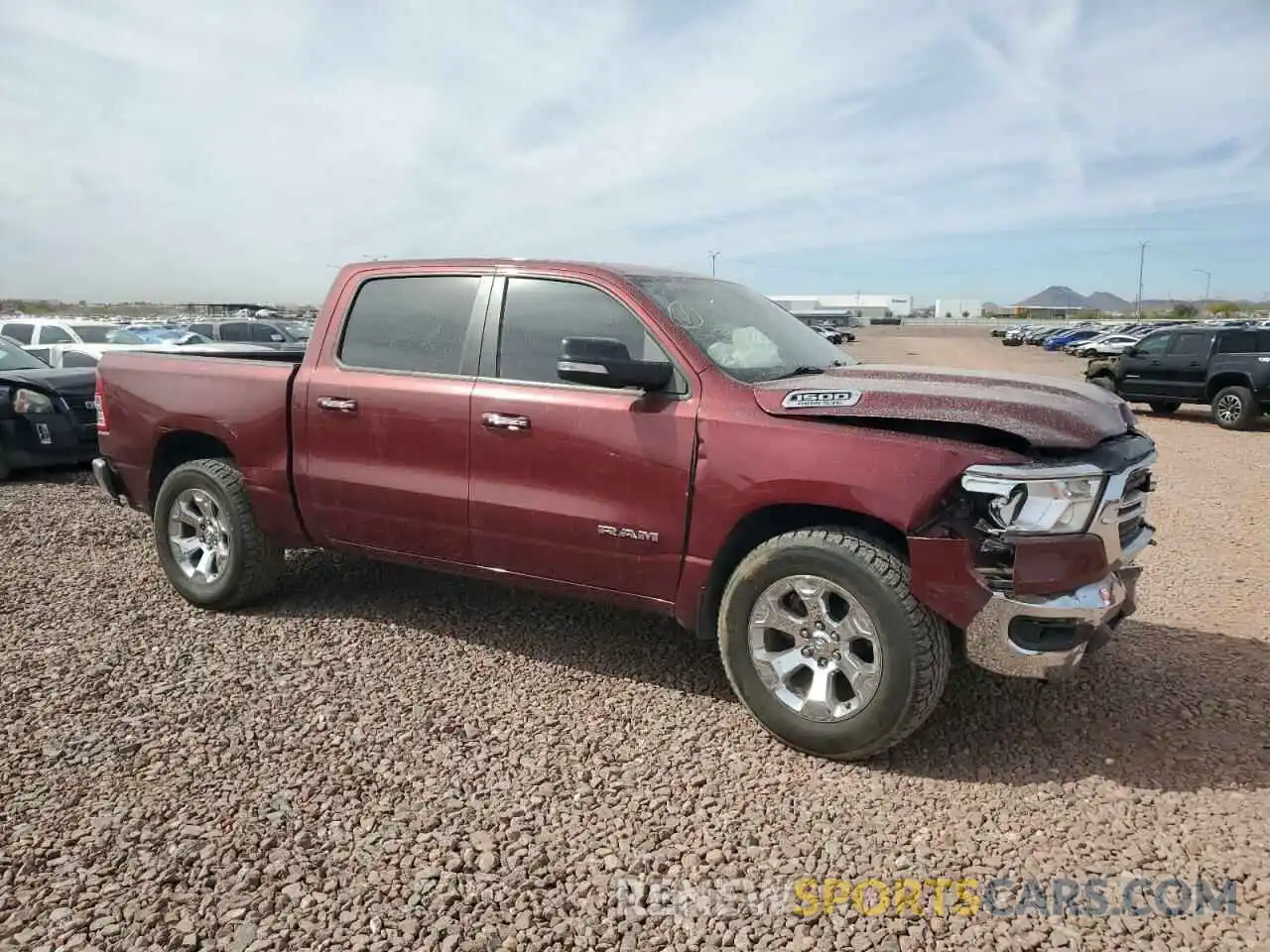 4 Photograph of a damaged car 1C6SRFFTXKN907094 RAM 1500 2019