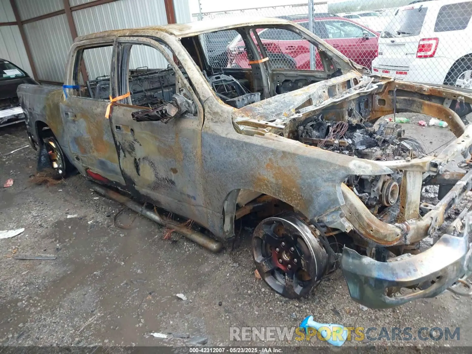 1 Photograph of a damaged car 1C6SRFGT2KN591334 RAM 1500 2019