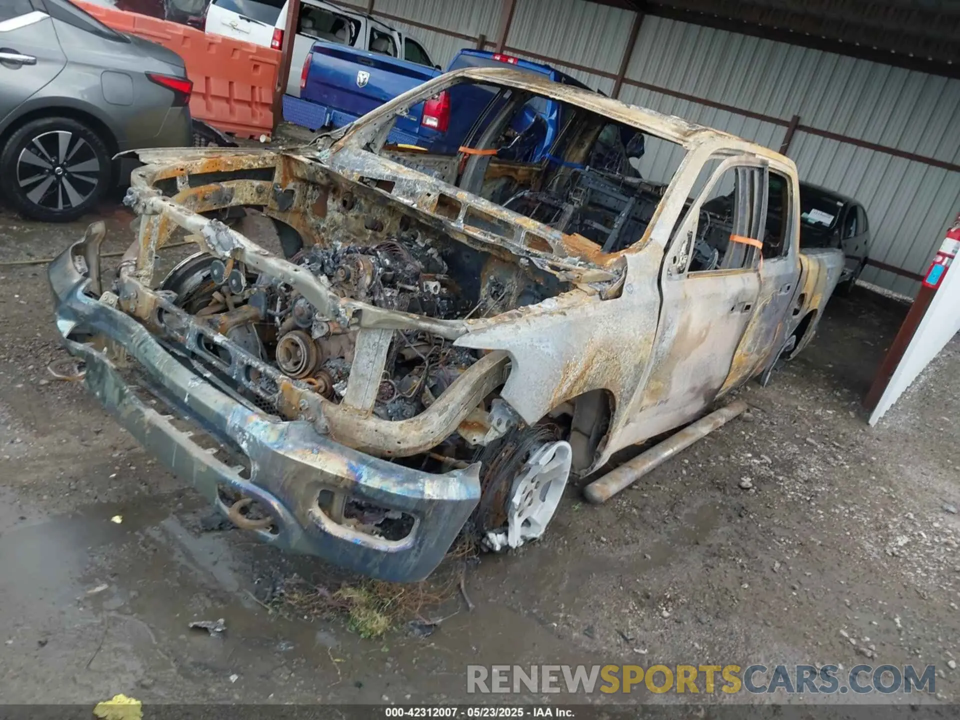 2 Photograph of a damaged car 1C6SRFGT2KN591334 RAM 1500 2019