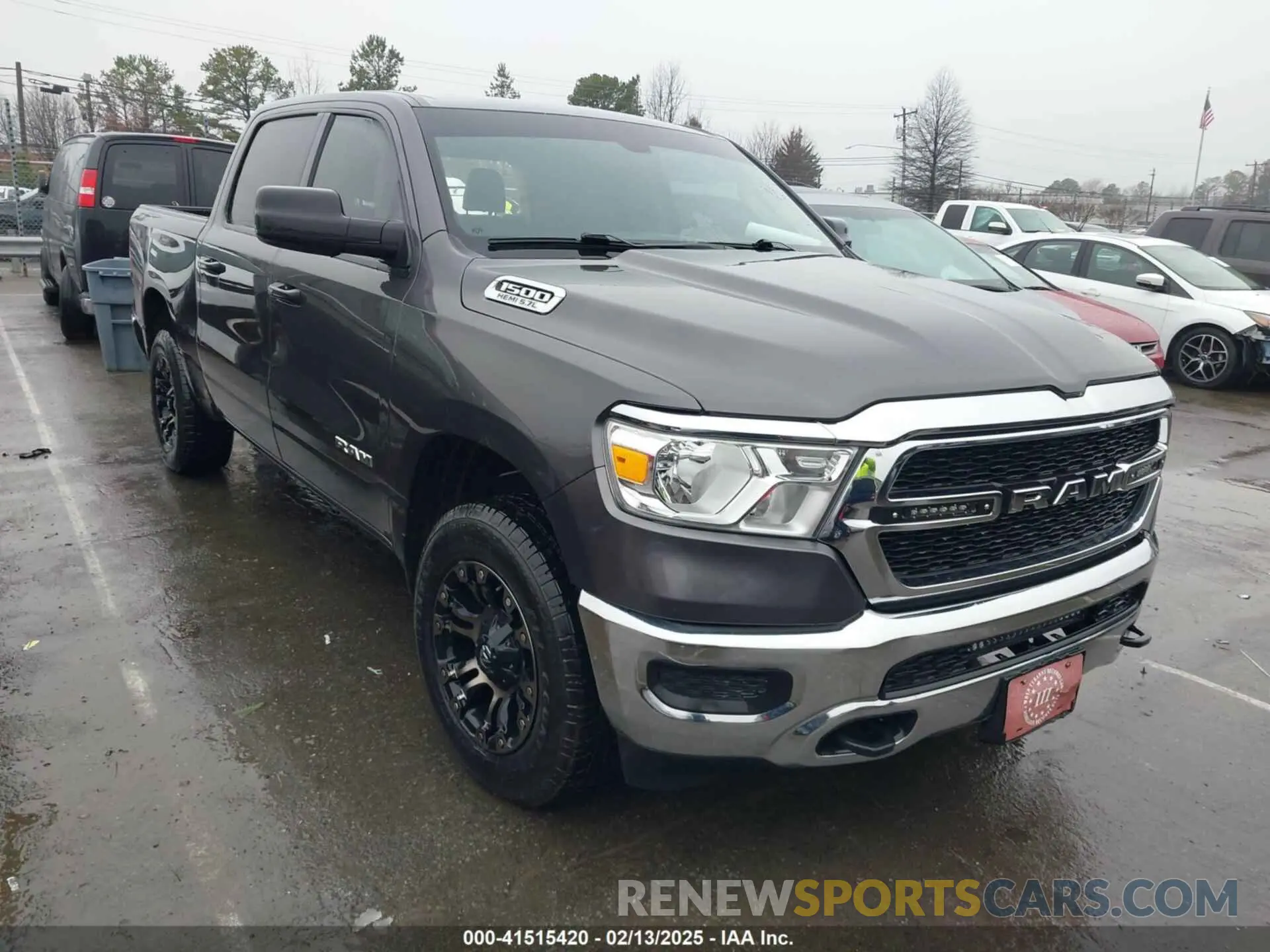 1 Photograph of a damaged car 1C6SRFGT5KN598052 RAM 1500 2019