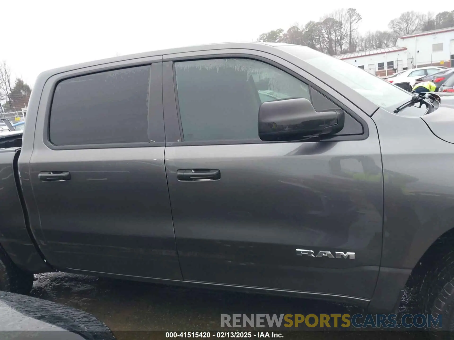 13 Photograph of a damaged car 1C6SRFGT5KN598052 RAM 1500 2019