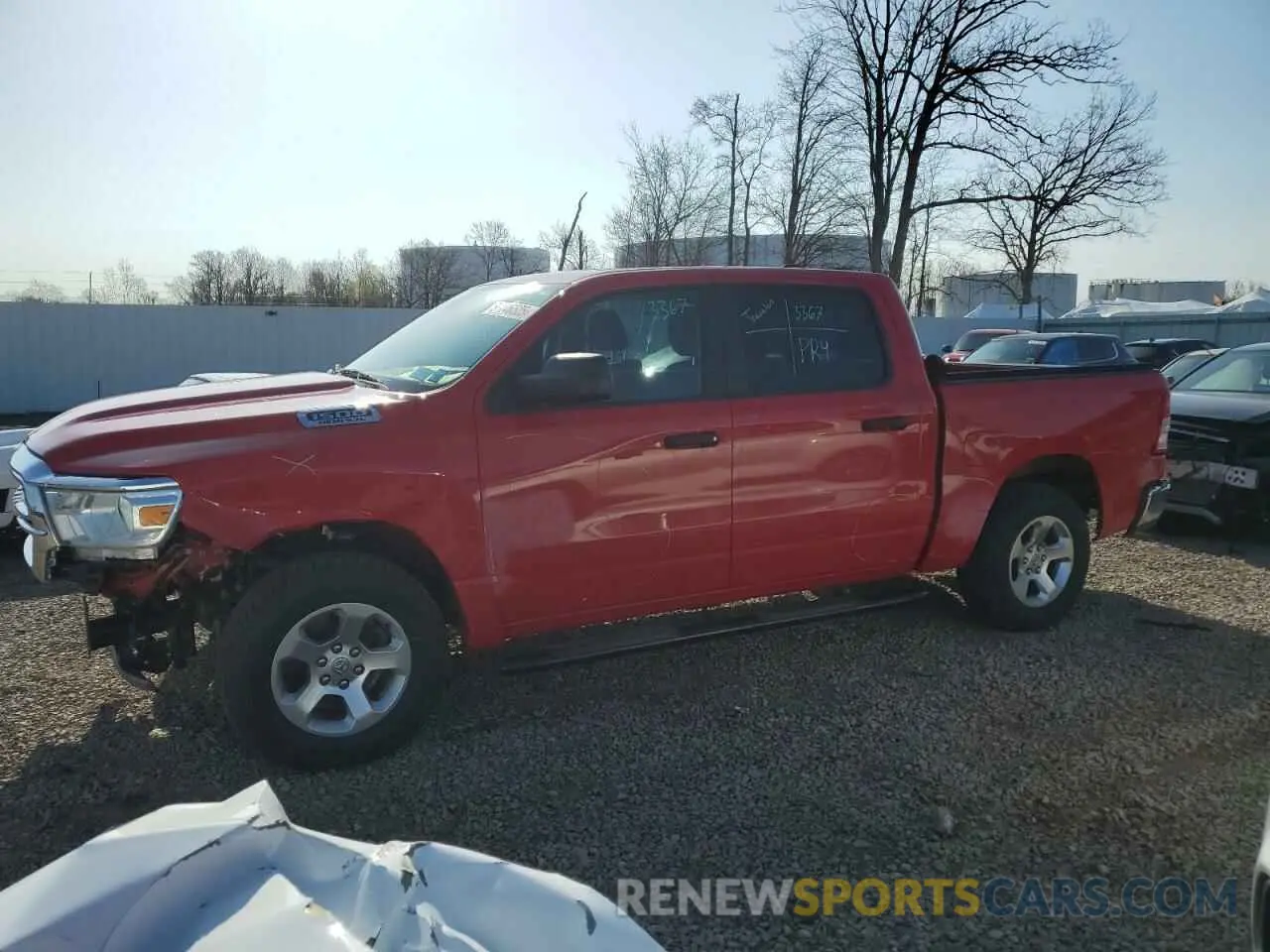 1 Photograph of a damaged car 1C6SRFGTXKN605450 RAM 1500 2019