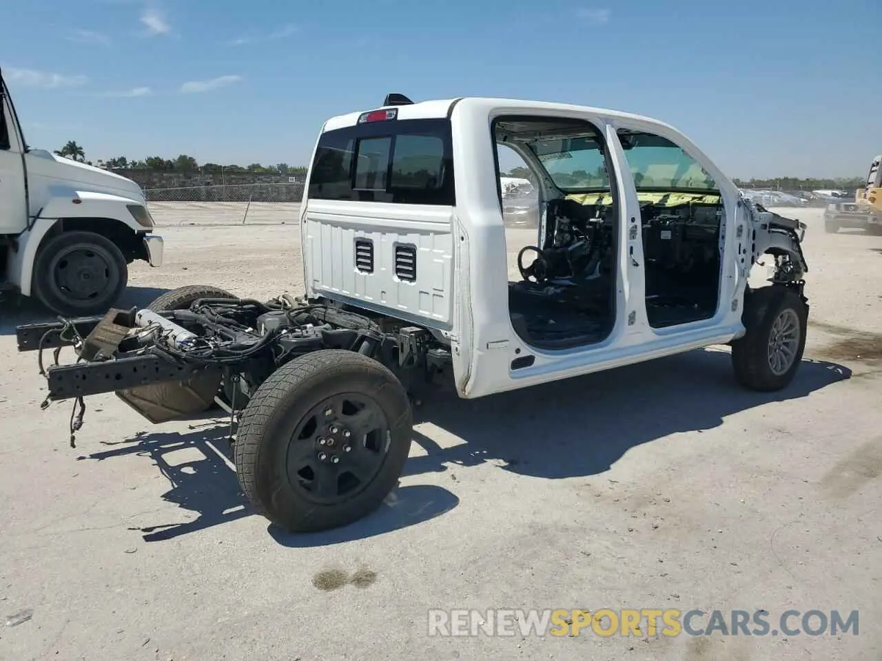 3 Photograph of a damaged car 1C6SRFHT0KN671892 RAM 1500 2019