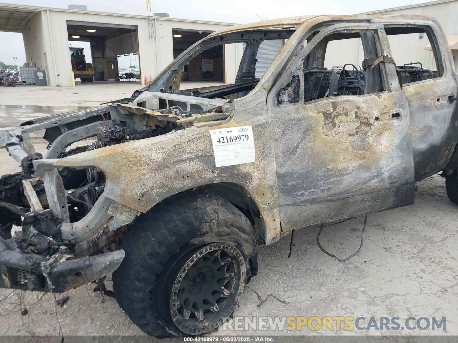 11 Photograph of a damaged car 1C6SRFHT2KN923691 RAM 1500 2019