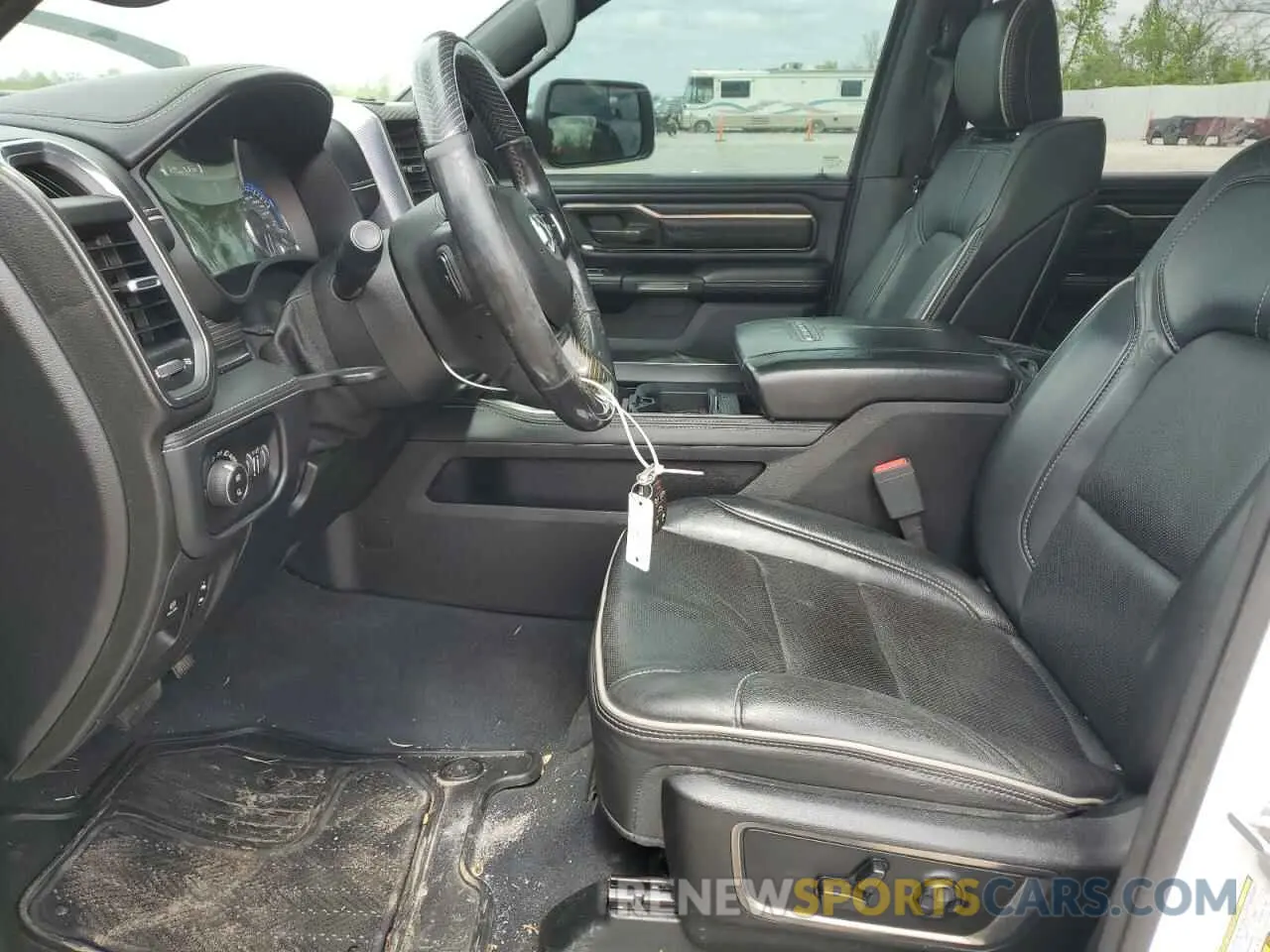 7 Photograph of a damaged car 1C6SRFHT3KN559443 RAM 1500 2019