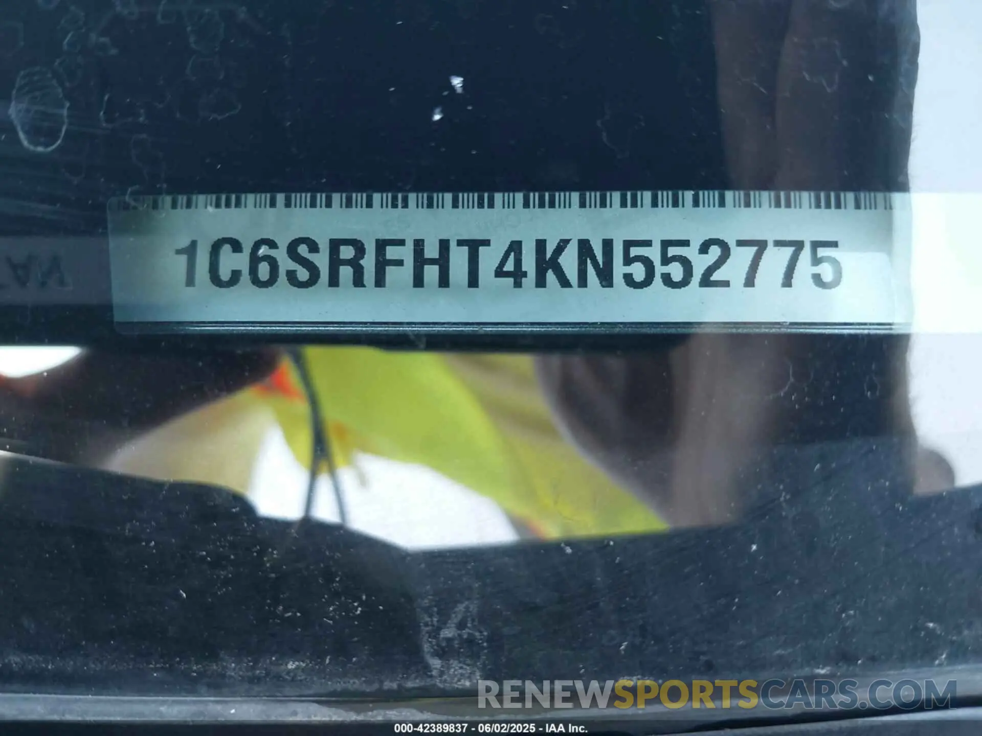 9 Photograph of a damaged car 1C6SRFHT4KN552775 RAM 1500 2019