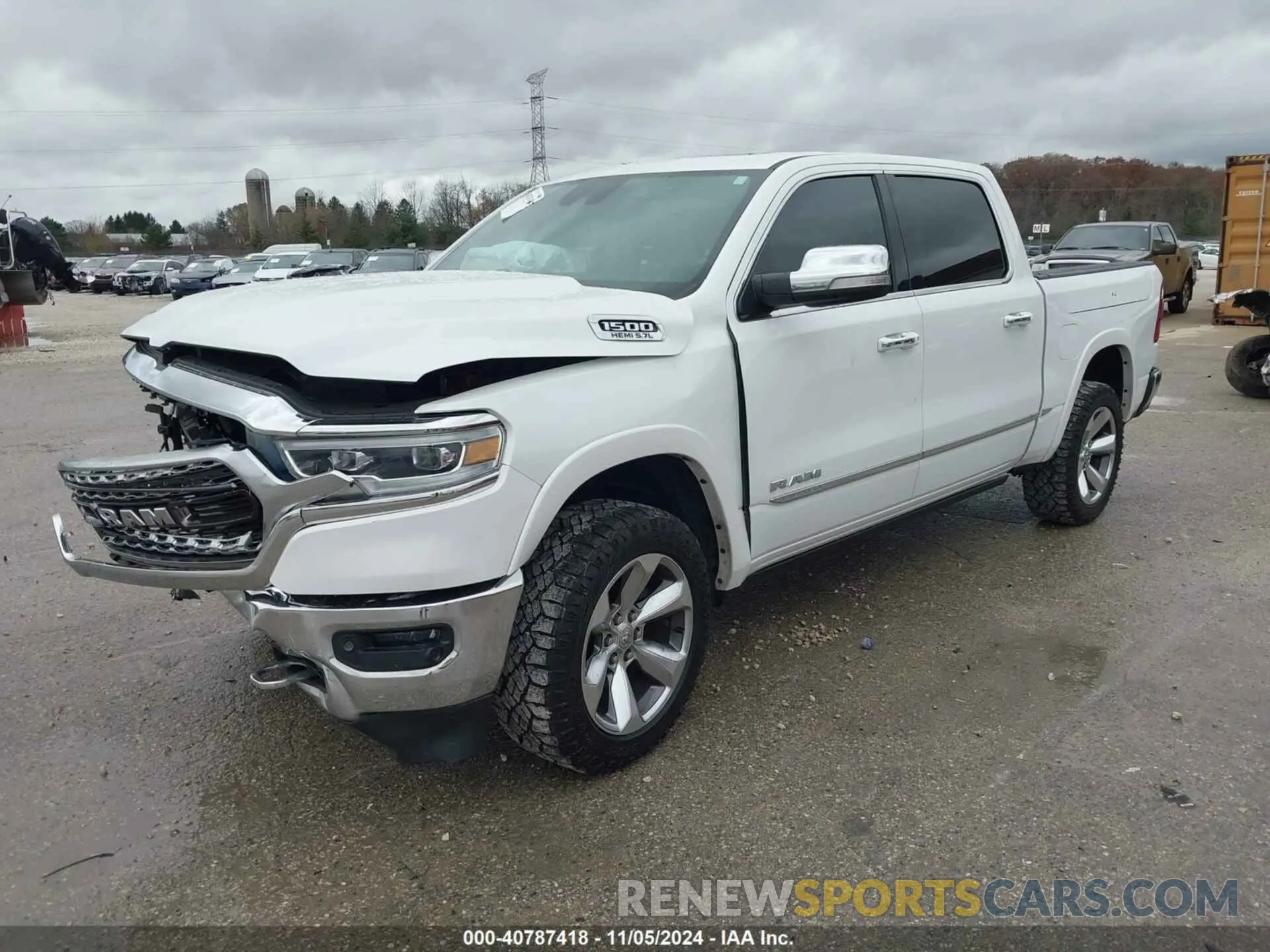 2 Photograph of a damaged car 1C6SRFHT5KN670477 RAM 1500 2019
