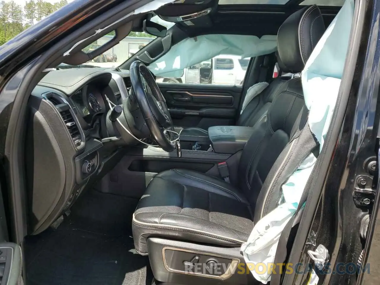 7 Photograph of a damaged car 1C6SRFHT5KN672830 RAM 1500 2019