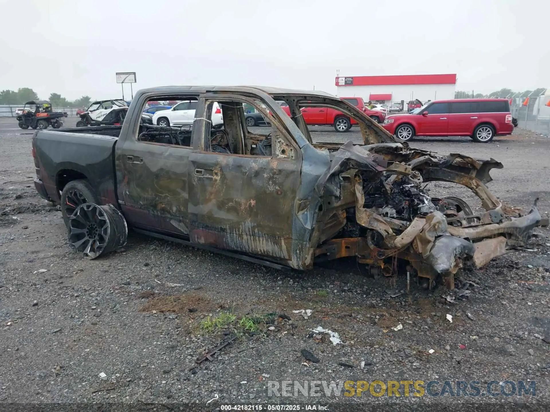 1 Photograph of a damaged car 1C6SRFHT6KN594249 RAM 1500 2019