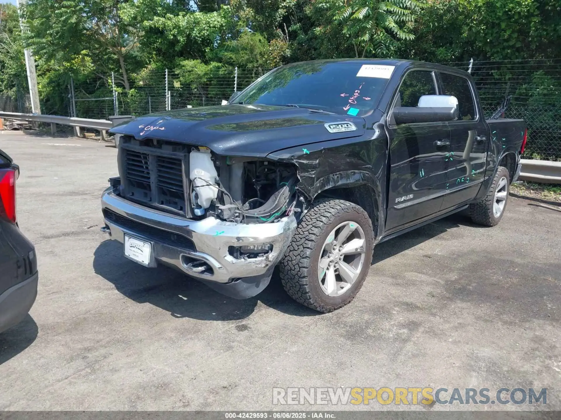2 Photograph of a damaged car 1C6SRFHT6KN673503 RAM 1500 2019