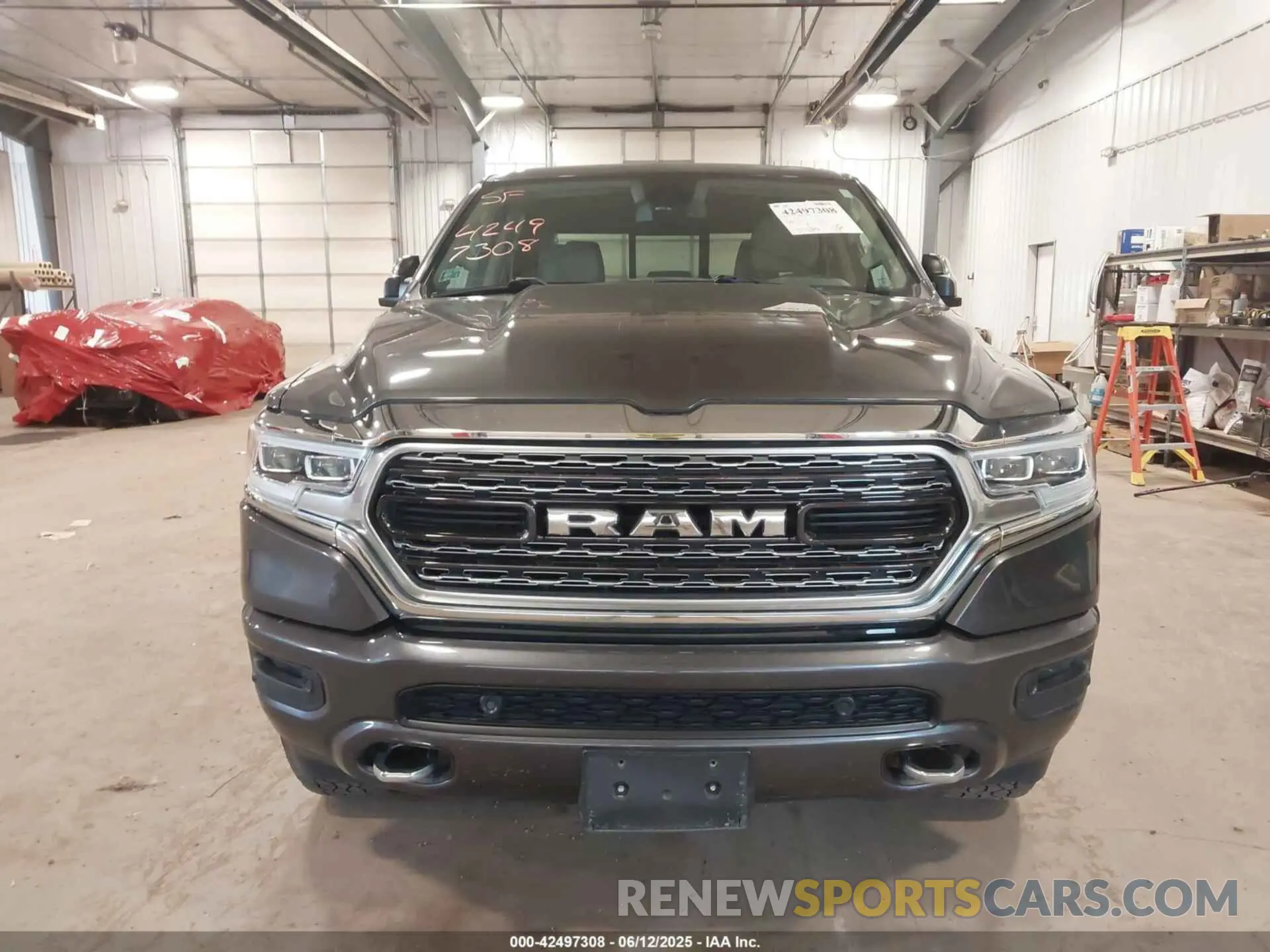 13 Photograph of a damaged car 1C6SRFHT6KN732727 RAM 1500 2019