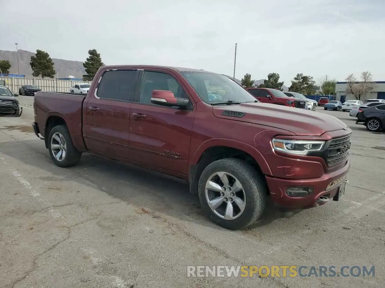 4 Photograph of a damaged car 1C6SRFHT6KN802033 RAM 1500 2019