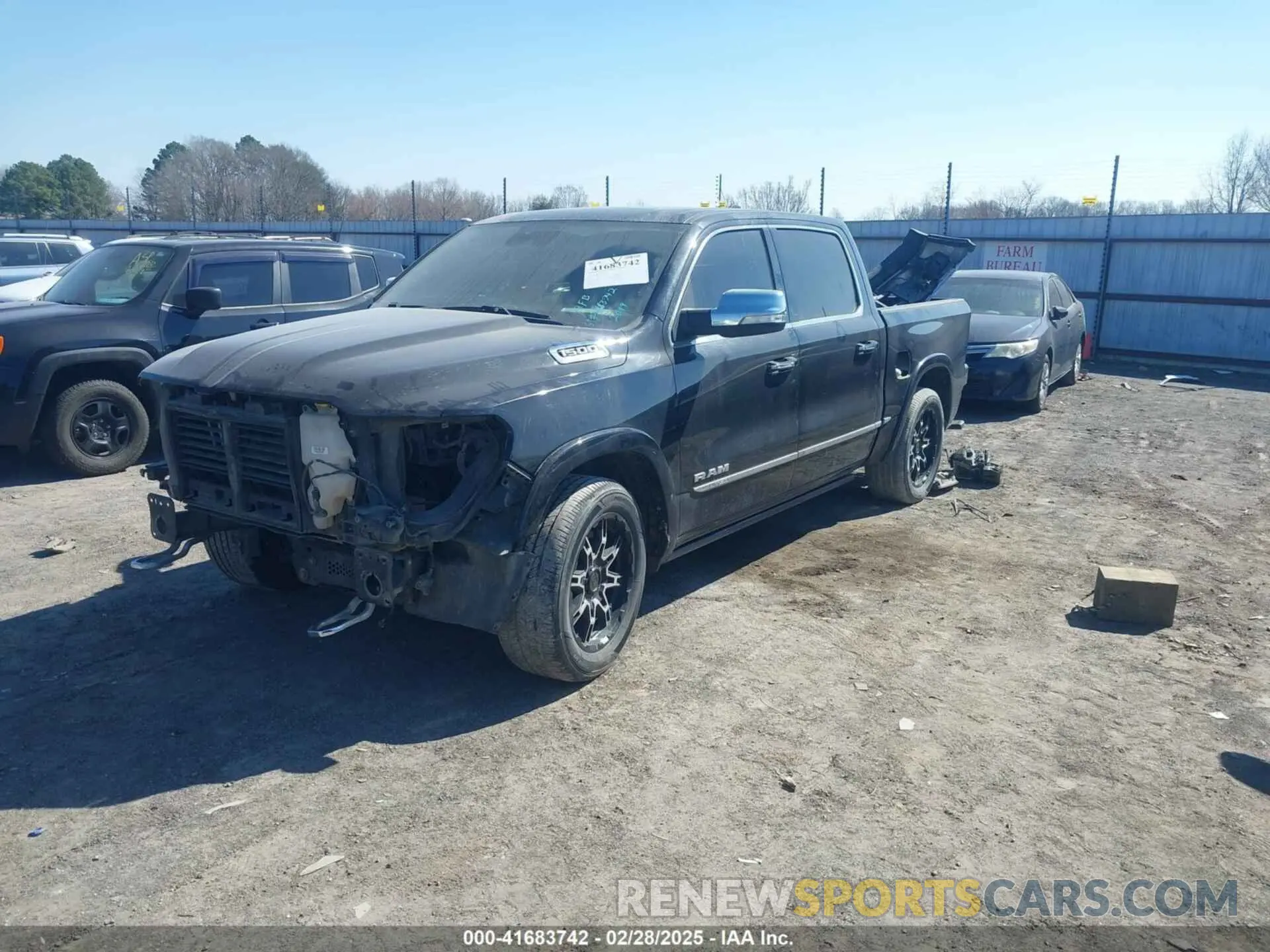 2 Photograph of a damaged car 1C6SRFHT7KN861608 RAM 1500 2019