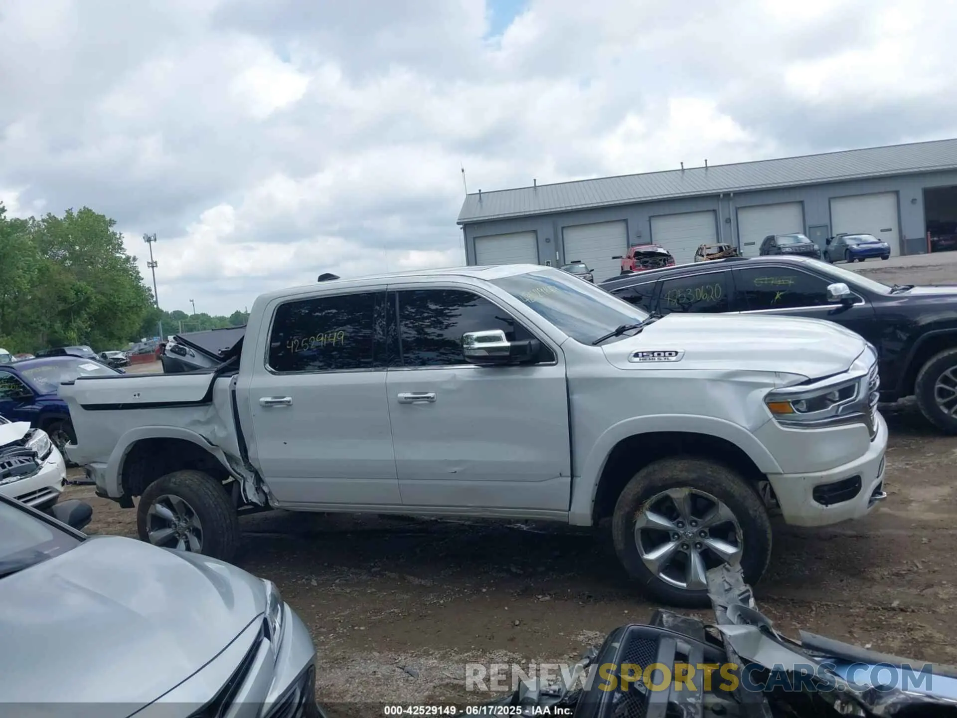 13 Photograph of a damaged car 1C6SRFHT8KN695891 RAM 1500 2019