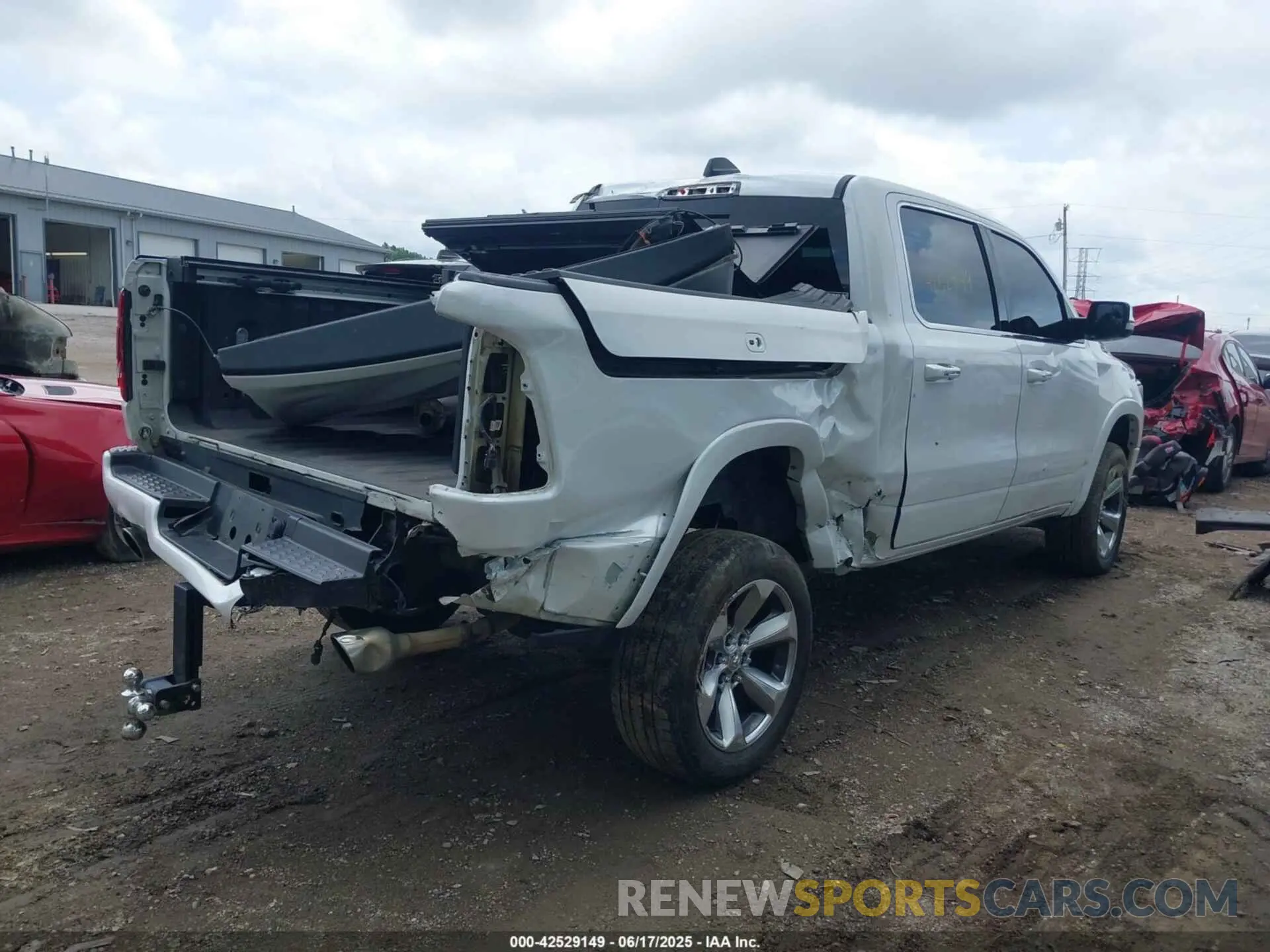 4 Photograph of a damaged car 1C6SRFHT8KN695891 RAM 1500 2019