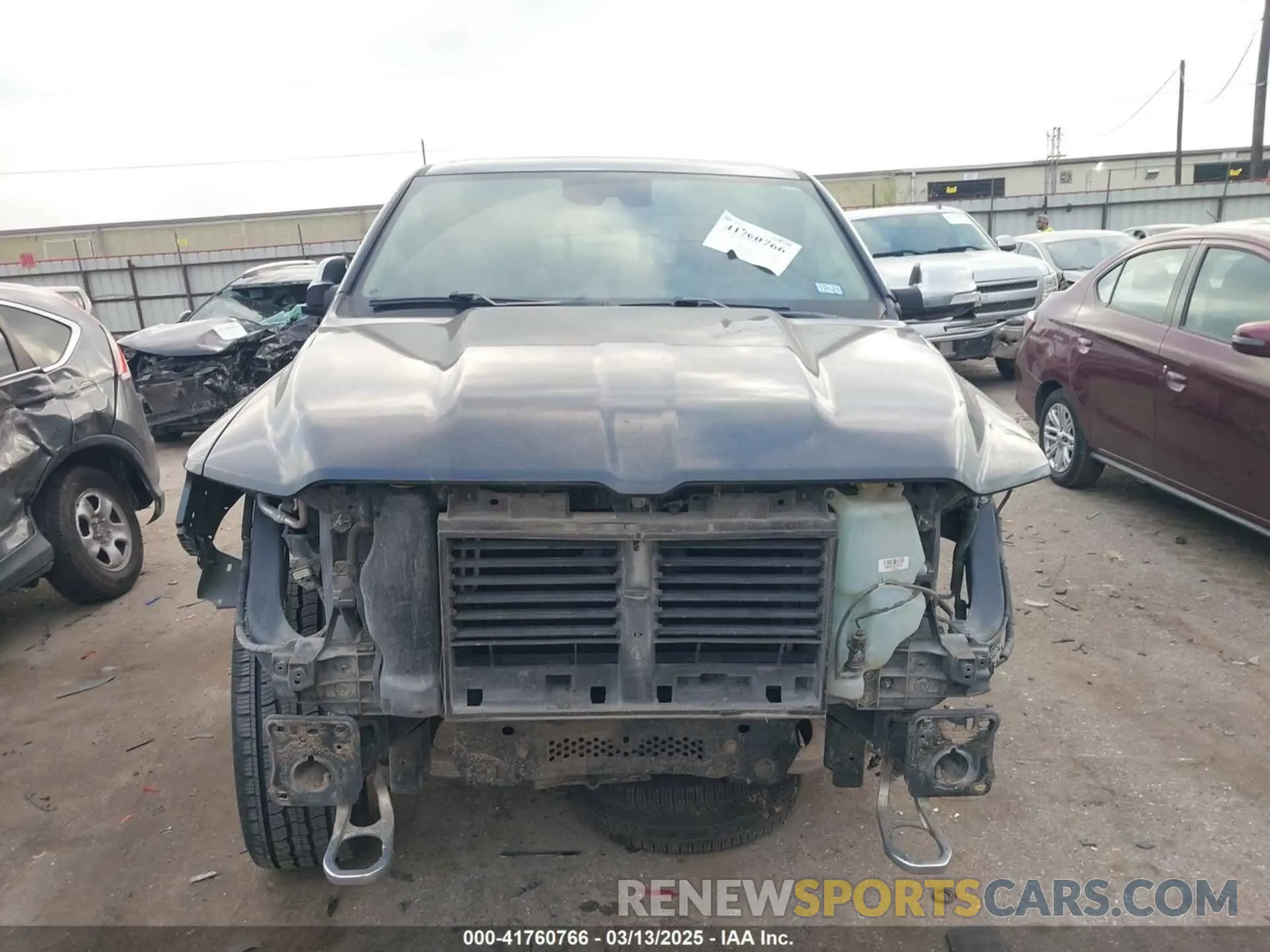 13 Photograph of a damaged car 1C6SRFHT9KN594990 RAM 1500 2019