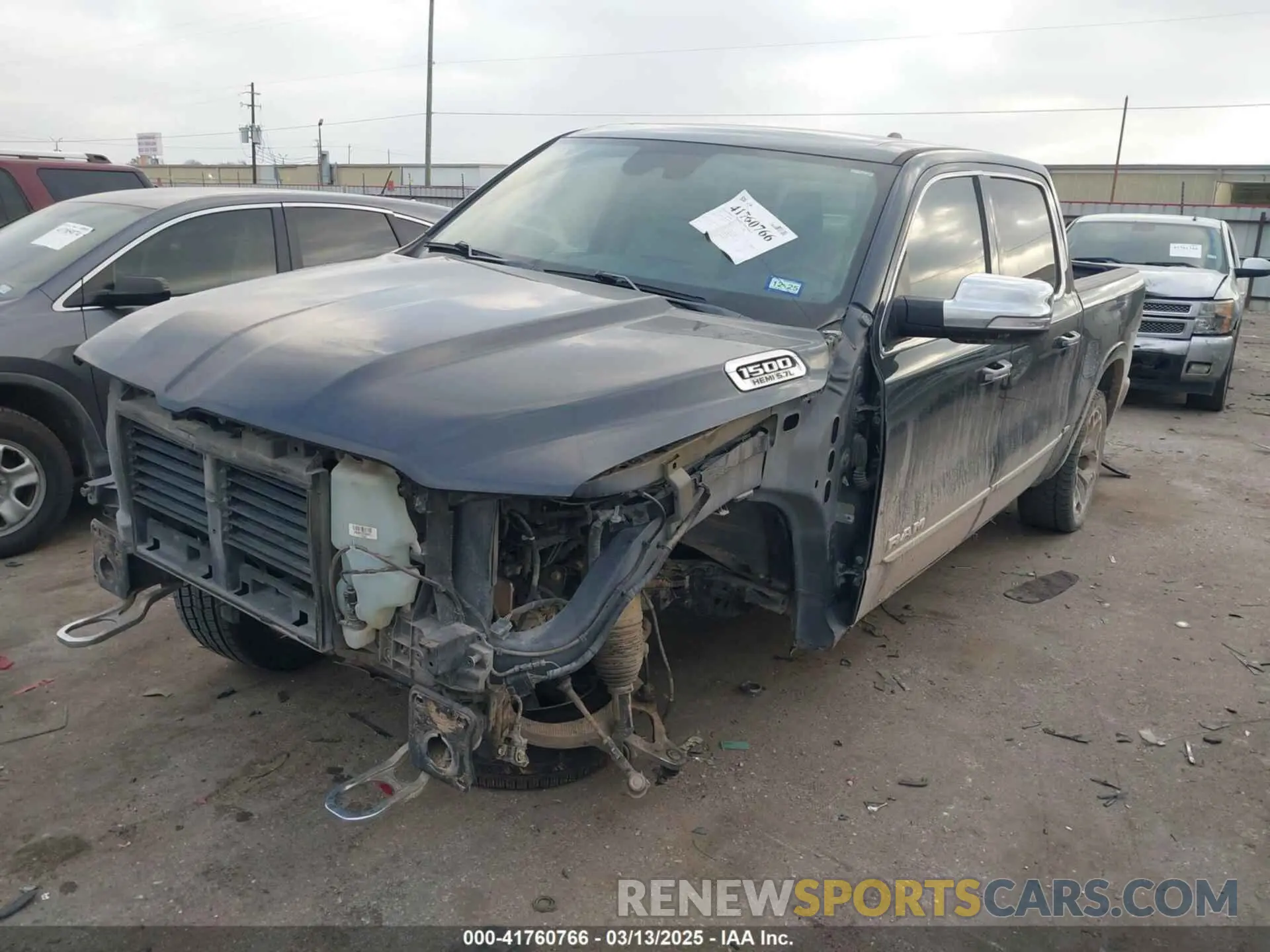 2 Photograph of a damaged car 1C6SRFHT9KN594990 RAM 1500 2019
