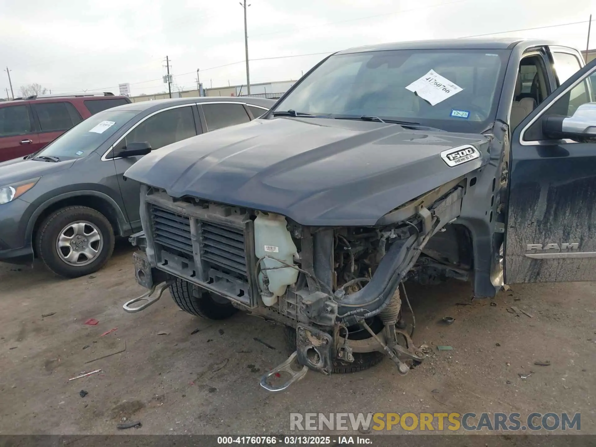 6 Photograph of a damaged car 1C6SRFHT9KN594990 RAM 1500 2019