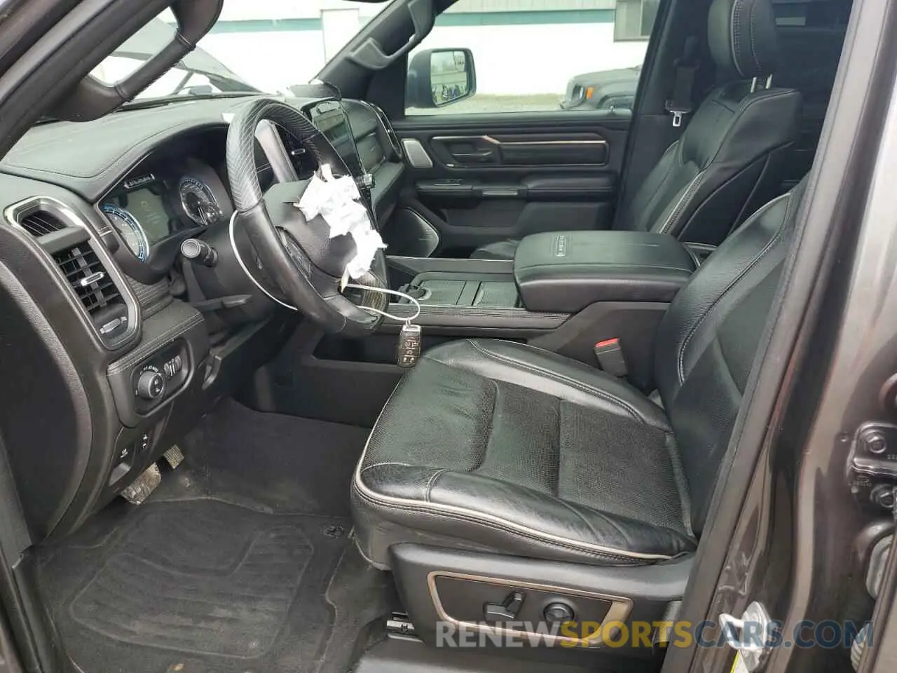 7 Photograph of a damaged car 1C6SRFHT9KN692739 RAM 1500 2019