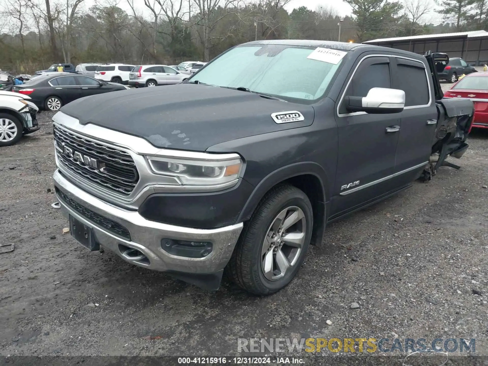 2 Photograph of a damaged car 1C6SRFHT9KN716599 RAM 1500 2019