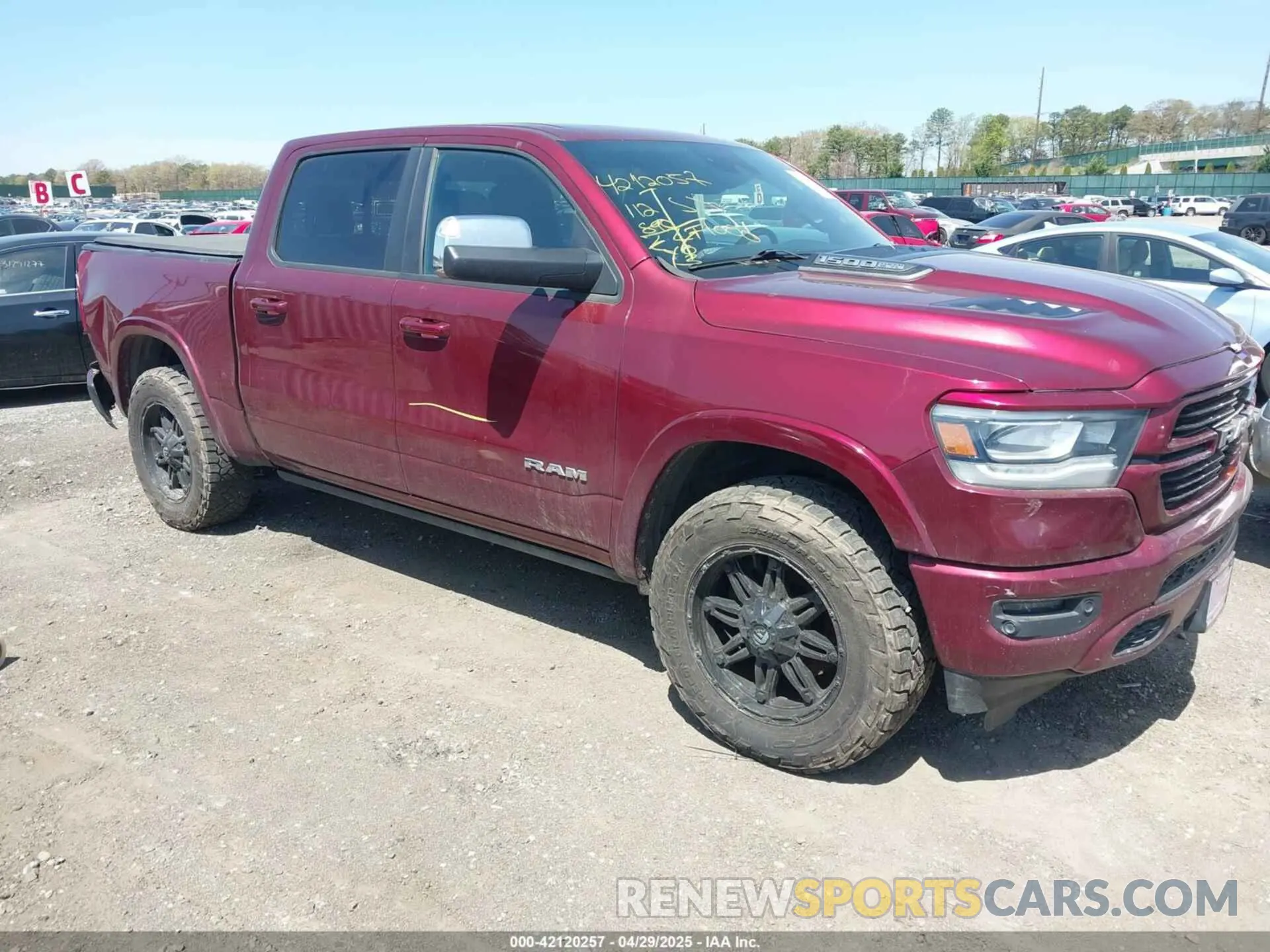 1 Photograph of a damaged car 1C6SRFJT0KN612643 RAM 1500 2019