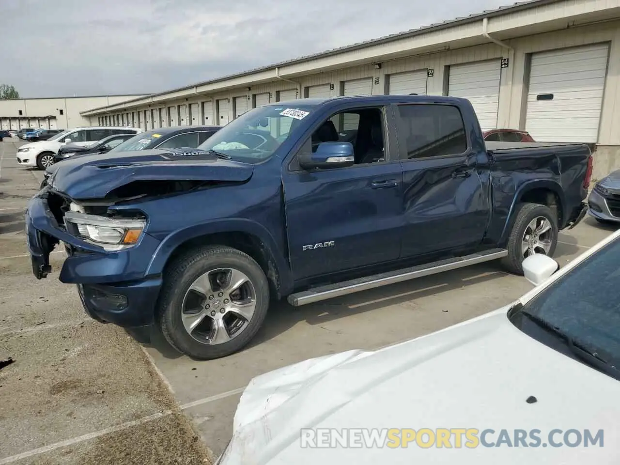 1 Photograph of a damaged car 1C6SRFJT0KN907693 RAM 1500 2019
