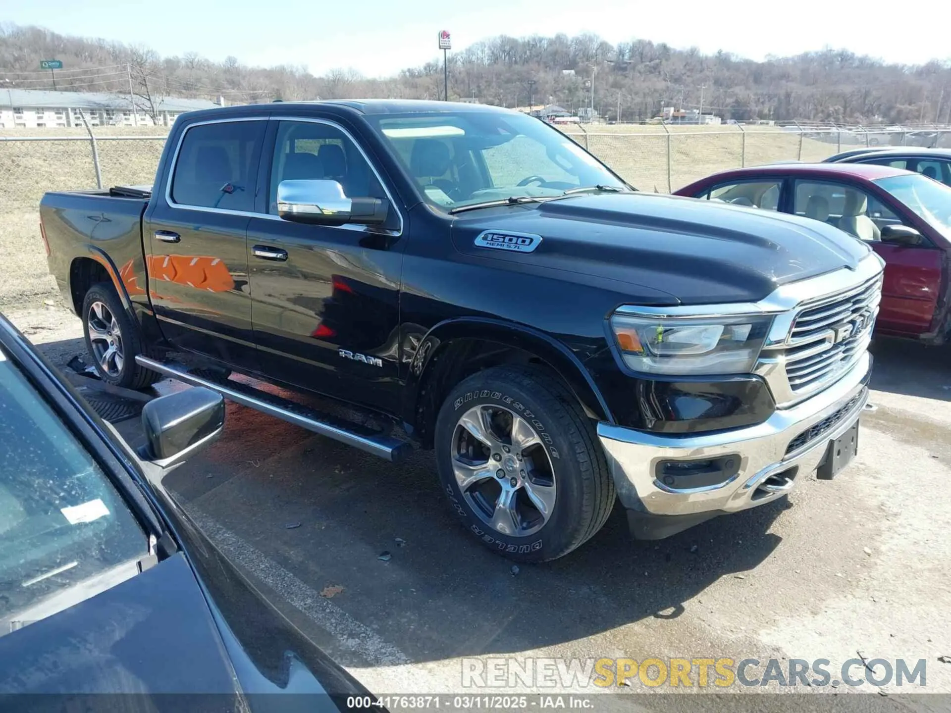 1 Photograph of a damaged car 1C6SRFJT1KN611808 RAM 1500 2019
