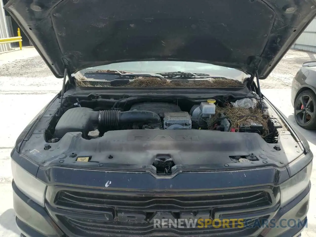 11 Photograph of a damaged car 1C6SRFJT1KN632903 RAM 1500 2019