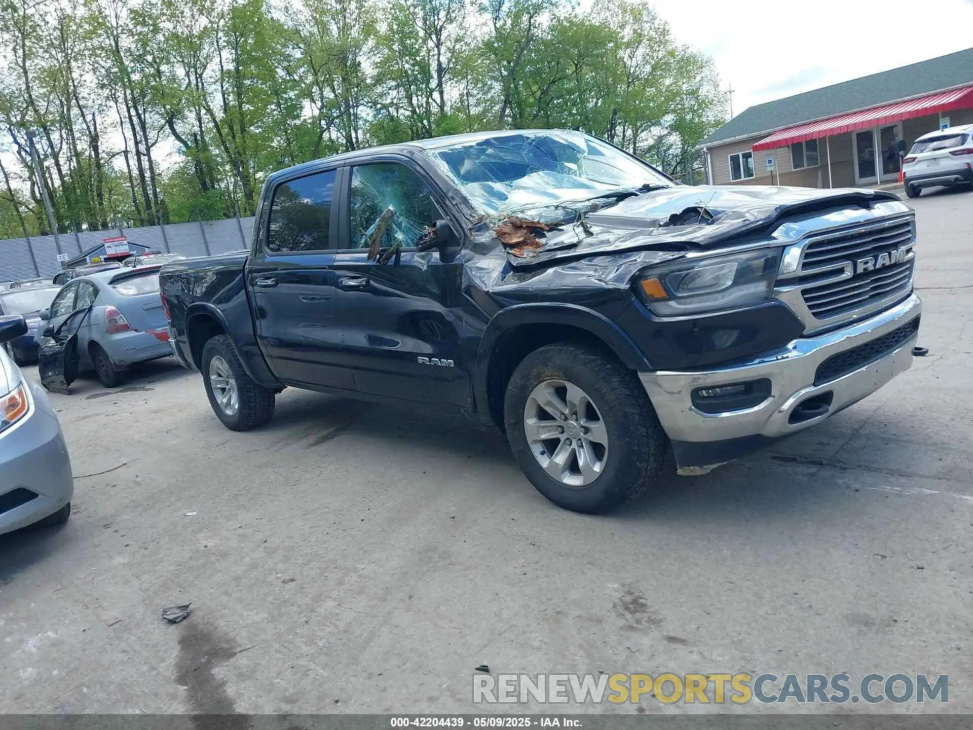 1 Photograph of a damaged car 1C6SRFJT1KN725291 RAM 1500 2019
