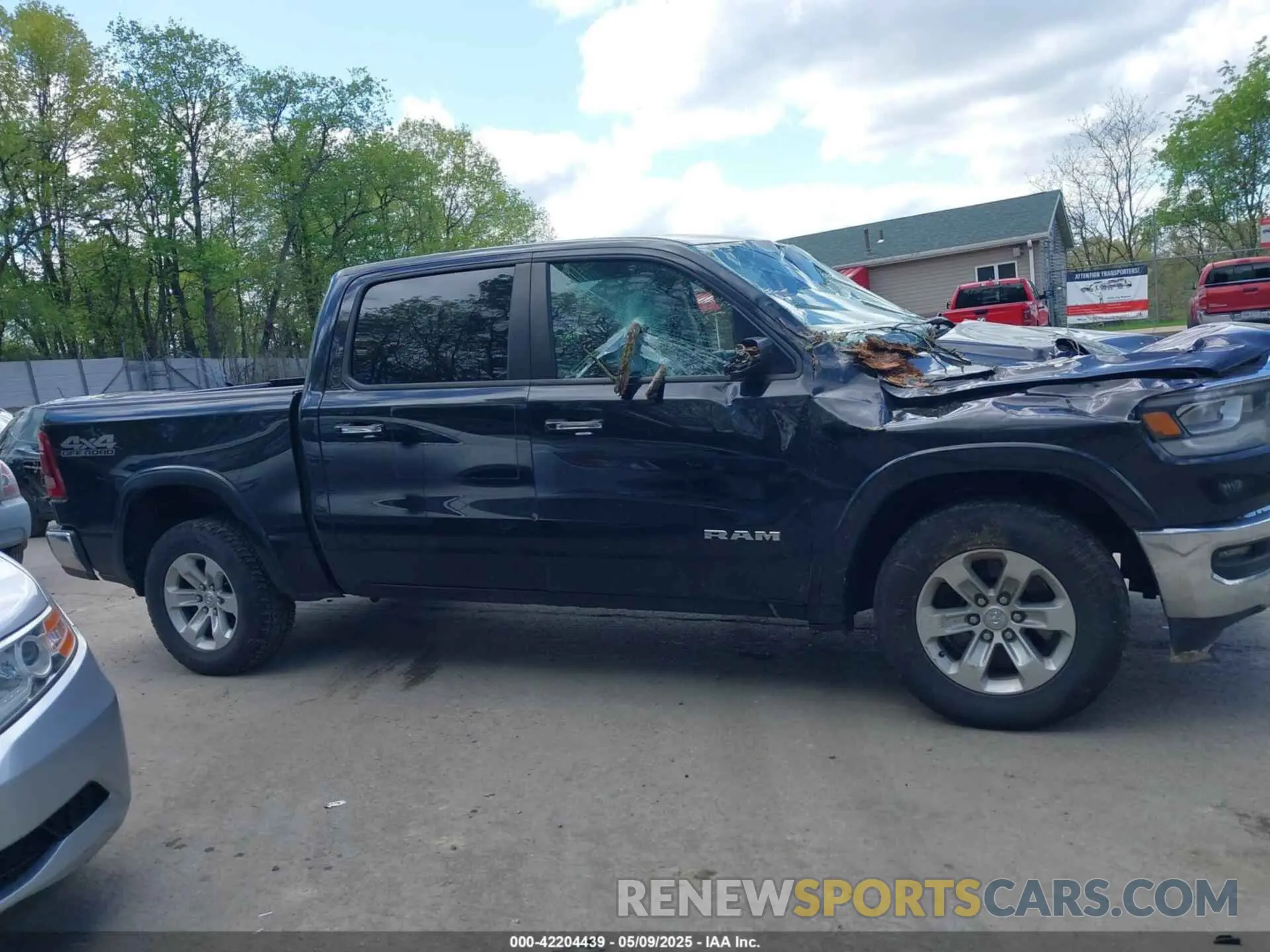 13 Photograph of a damaged car 1C6SRFJT1KN725291 RAM 1500 2019