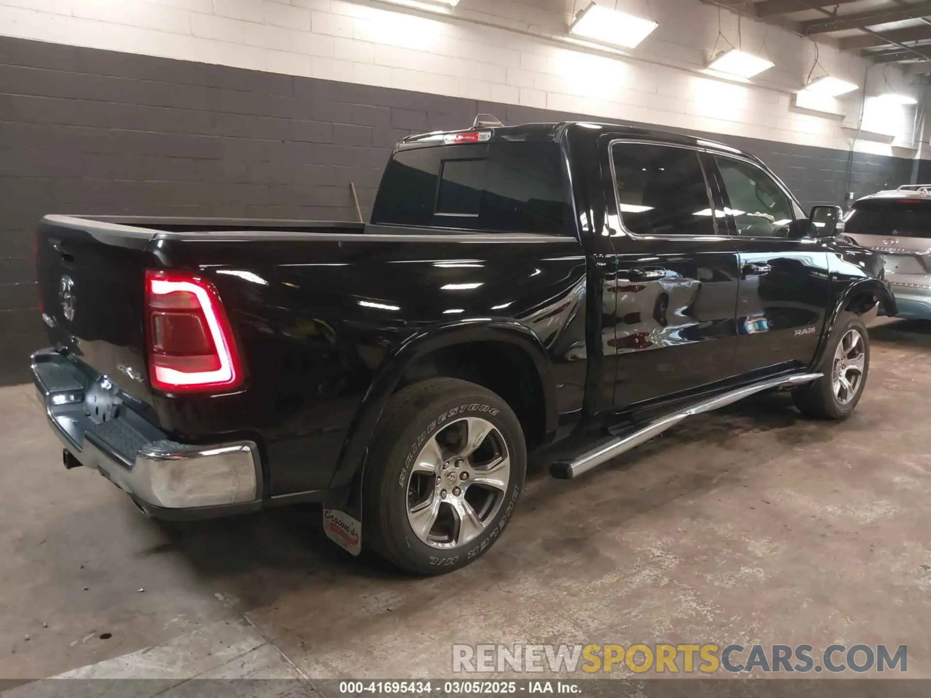 4 Photograph of a damaged car 1C6SRFJT3KN553829 RAM 1500 2019