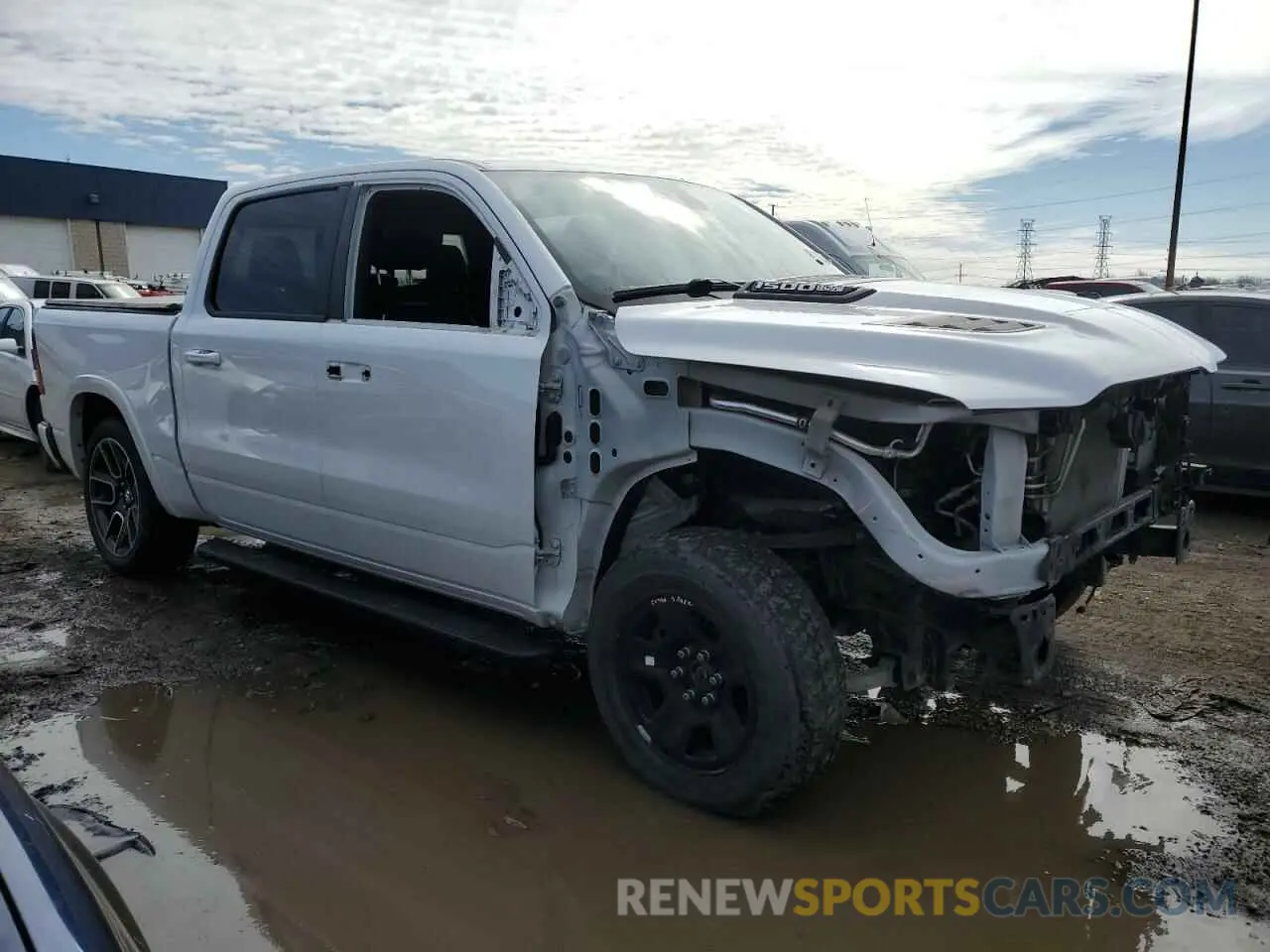 4 Photograph of a damaged car 1C6SRFJT3KN786593 RAM 1500 2019