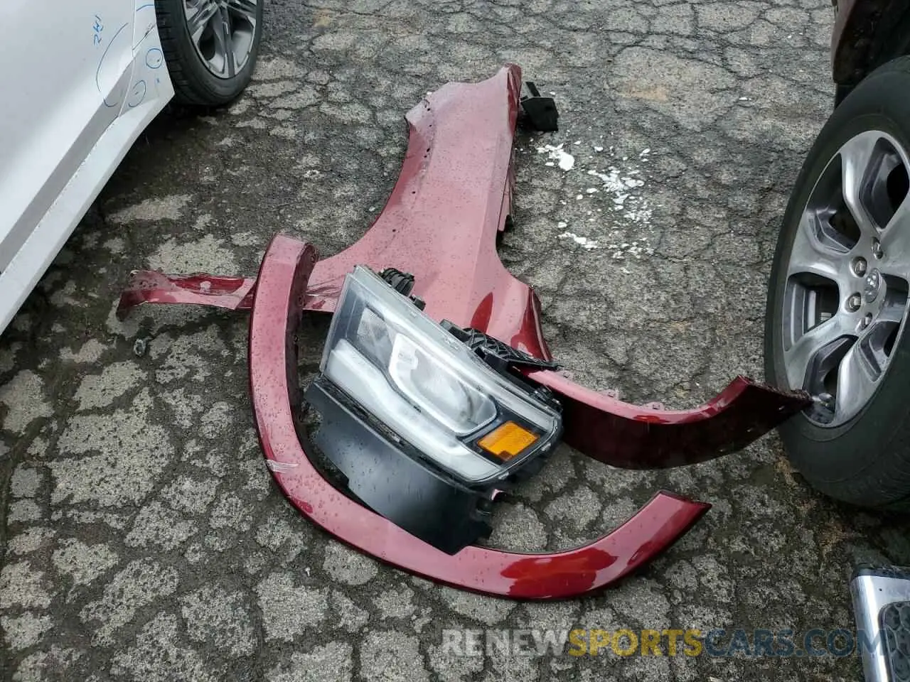 12 Photograph of a damaged car 1C6SRFJT4KN520838 RAM 1500 2019