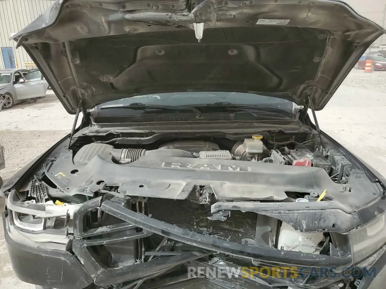 13 Photograph of a damaged car 1C6SRFJT4KN603136 RAM 1500 2019