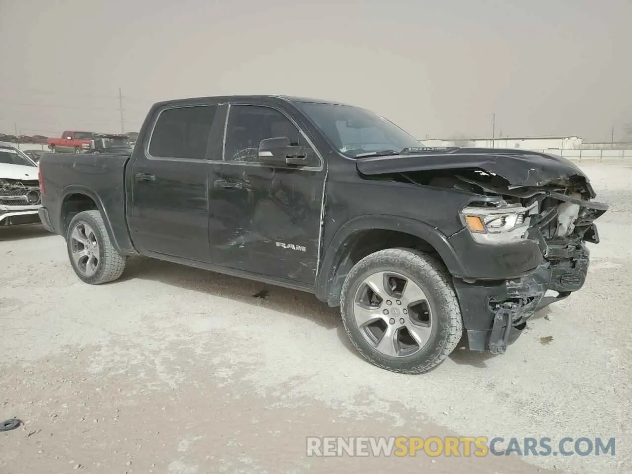 4 Photograph of a damaged car 1C6SRFJT4KN603136 RAM 1500 2019