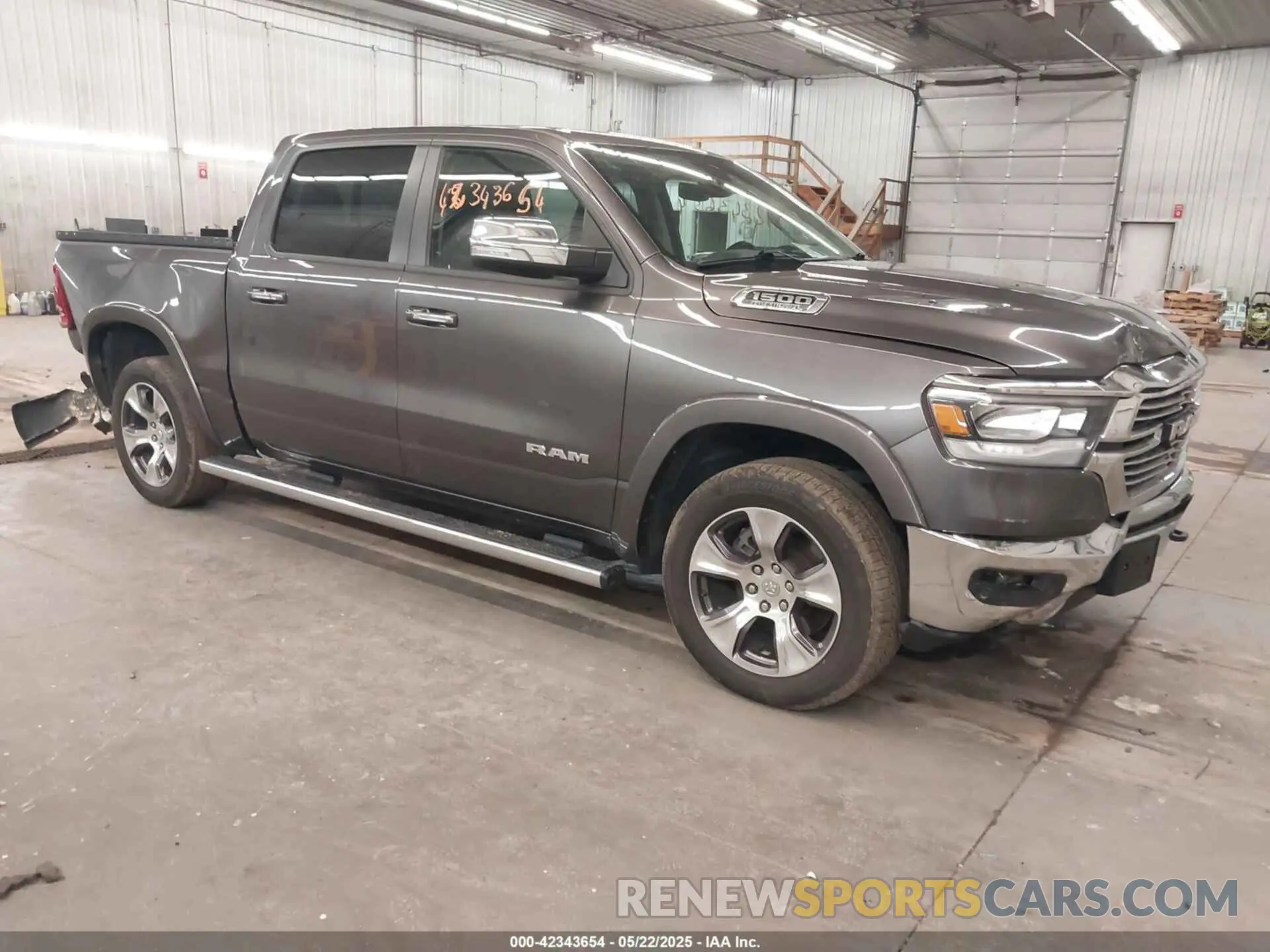1 Photograph of a damaged car 1C6SRFJT4KN777756 RAM 1500 2019