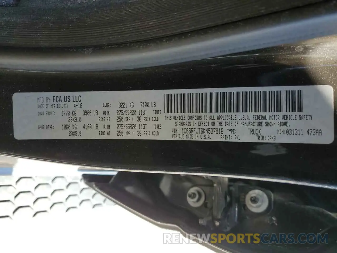 13 Photograph of a damaged car 1C6SRFJT6KN537916 RAM 1500 2019