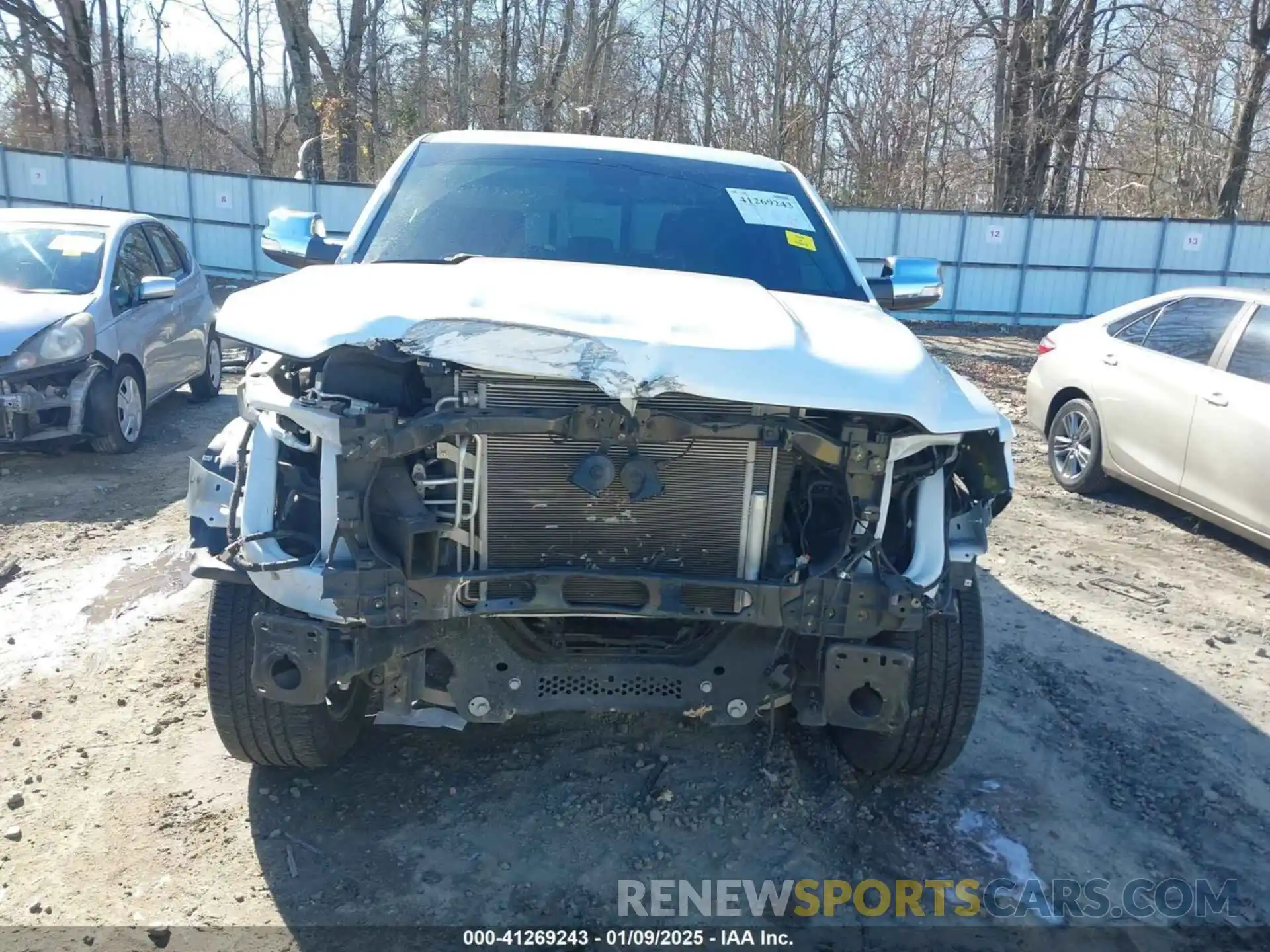 13 Photograph of a damaged car 1C6SRFJT6KN909240 RAM 1500 2019