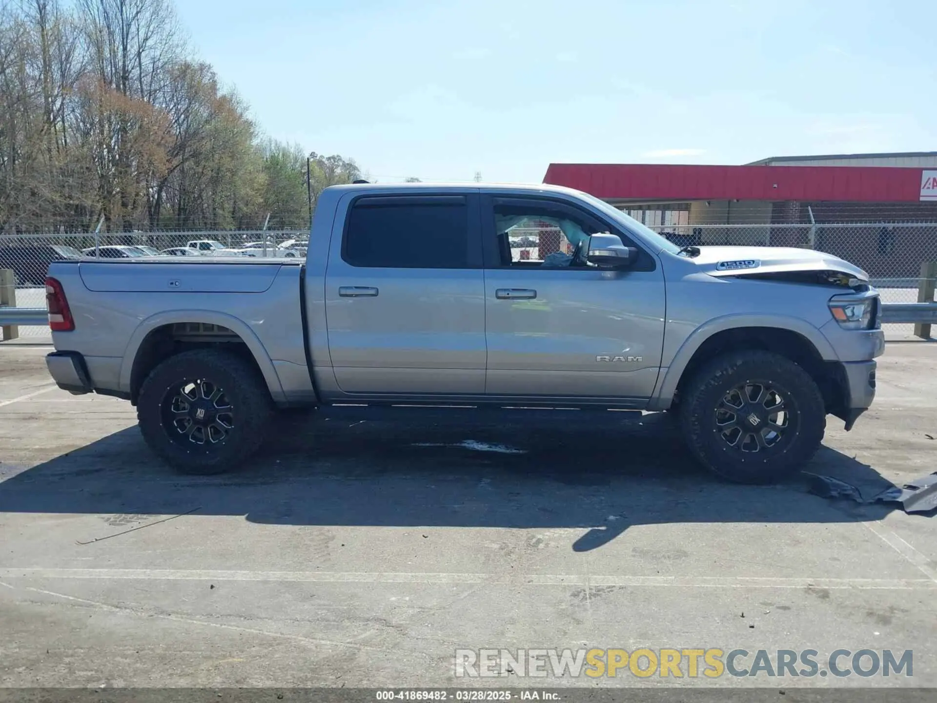 13 Photograph of a damaged car 1C6SRFJT6KN912204 RAM 1500 2019
