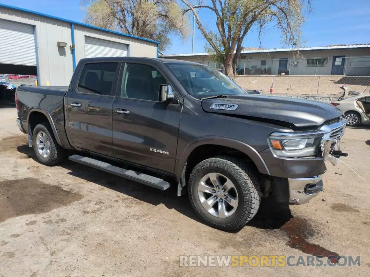 4 Photograph of a damaged car 1C6SRFJT9KN707086 RAM 1500 2019