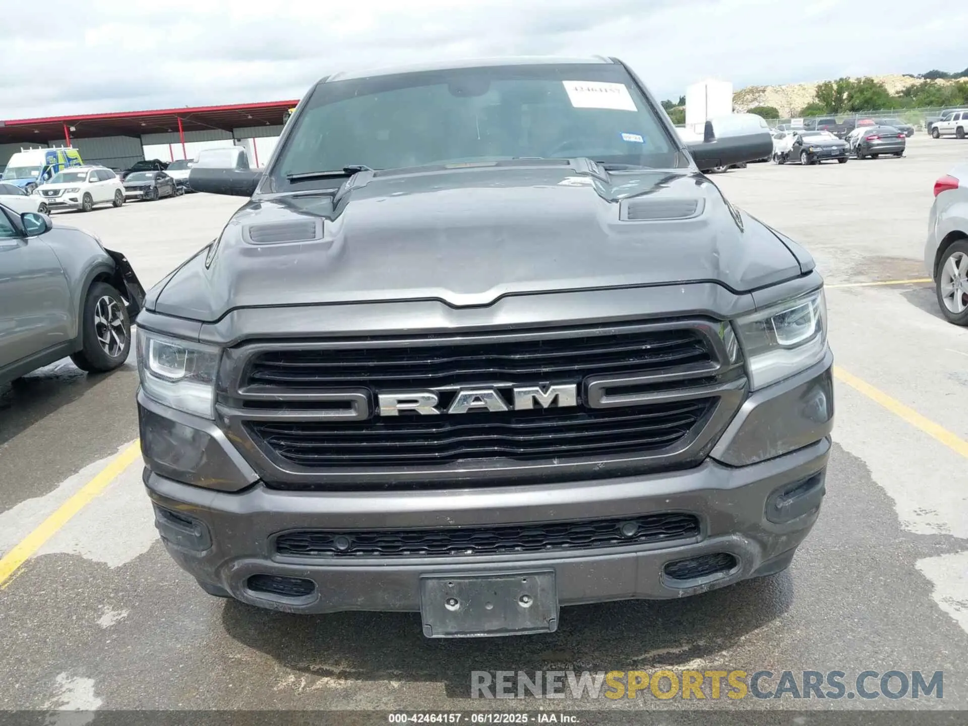 12 Photograph of a damaged car 1C6SRFJTXKN578372 RAM 1500 2019