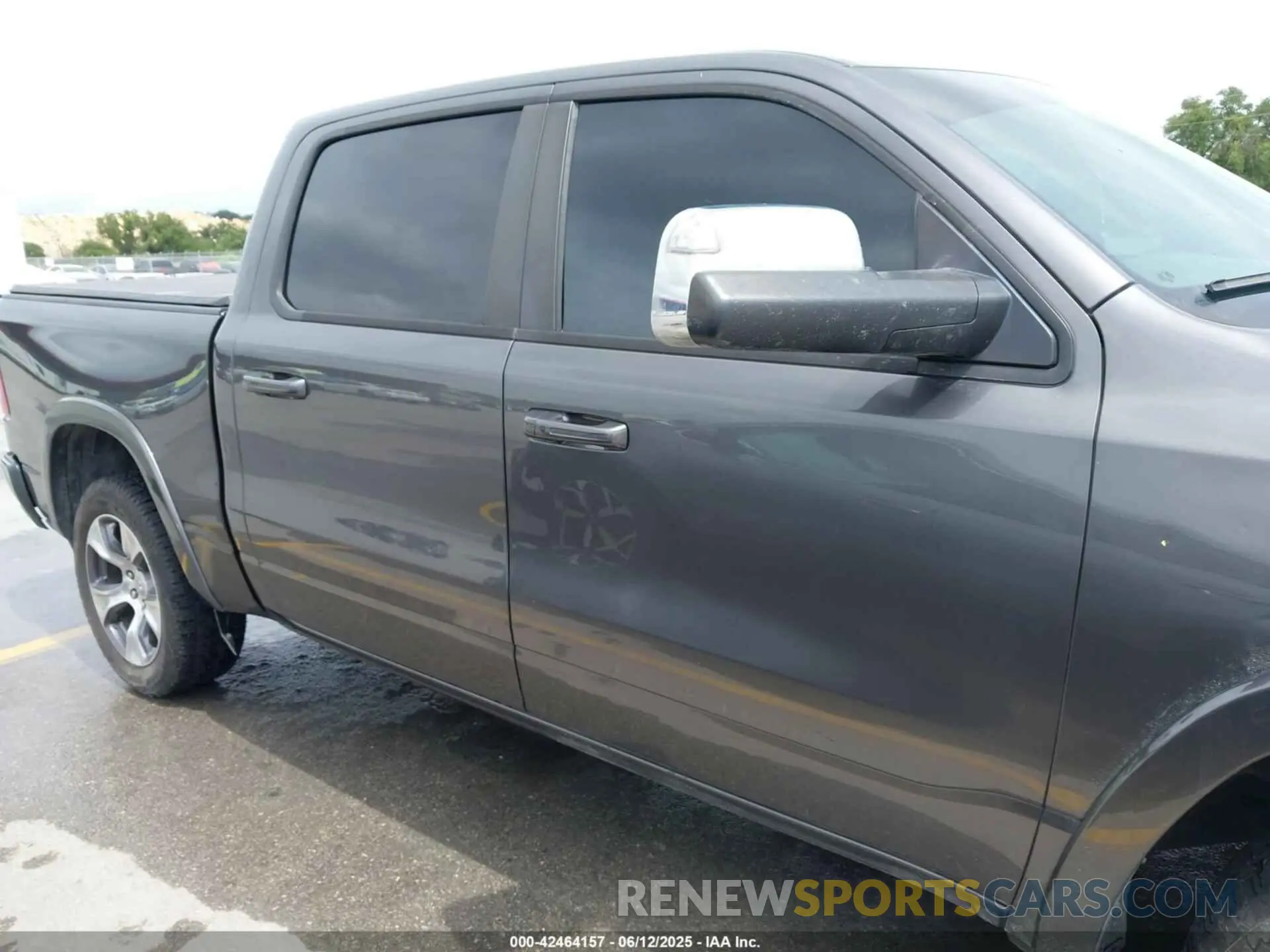 13 Photograph of a damaged car 1C6SRFJTXKN578372 RAM 1500 2019