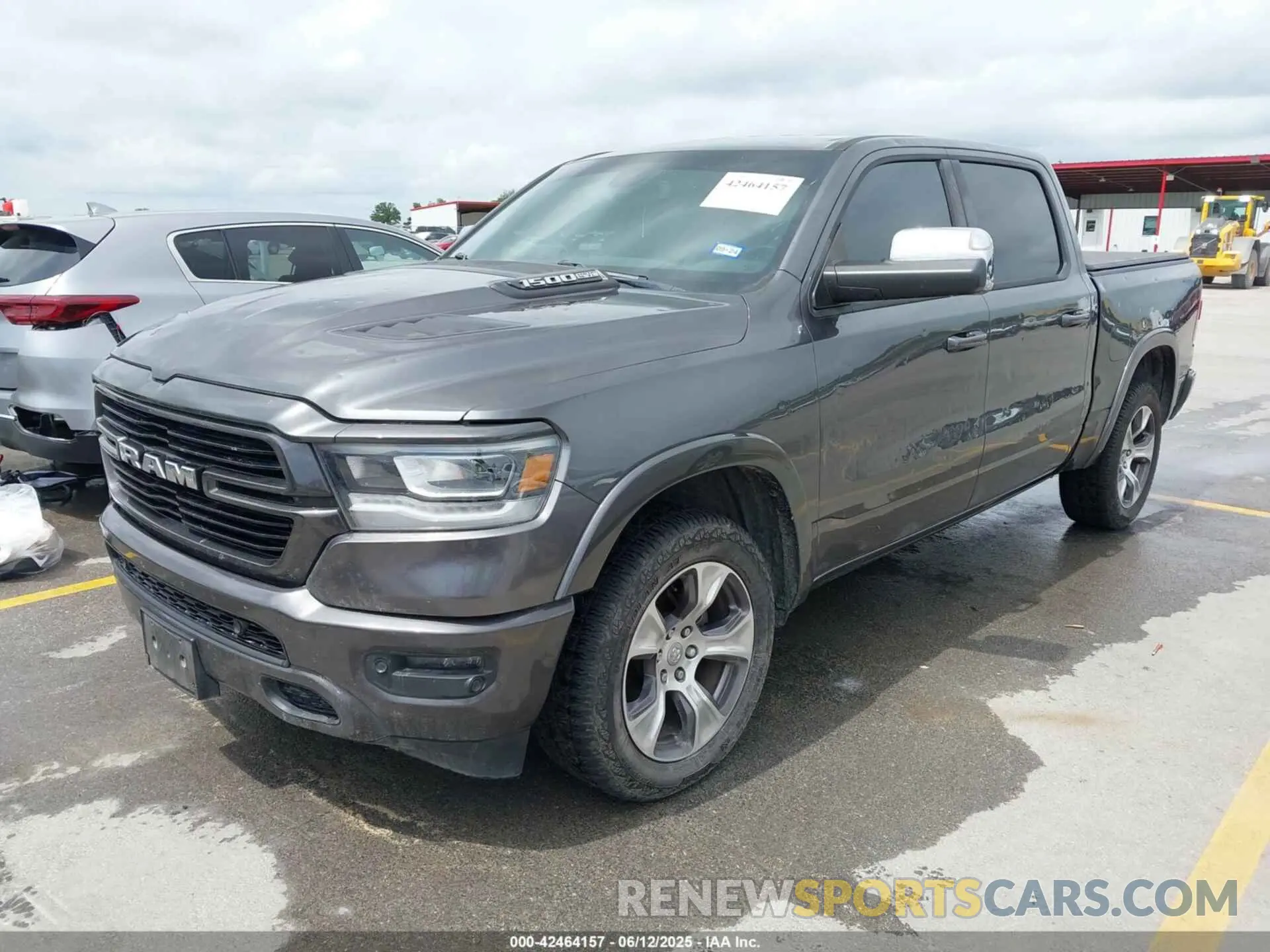 2 Photograph of a damaged car 1C6SRFJTXKN578372 RAM 1500 2019