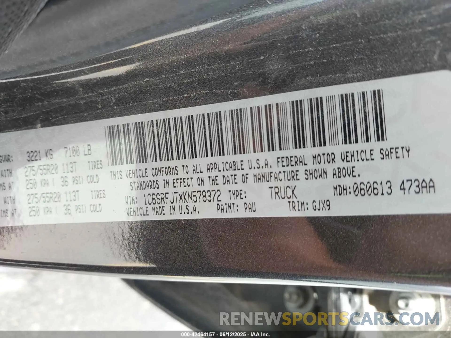 9 Photograph of a damaged car 1C6SRFJTXKN578372 RAM 1500 2019