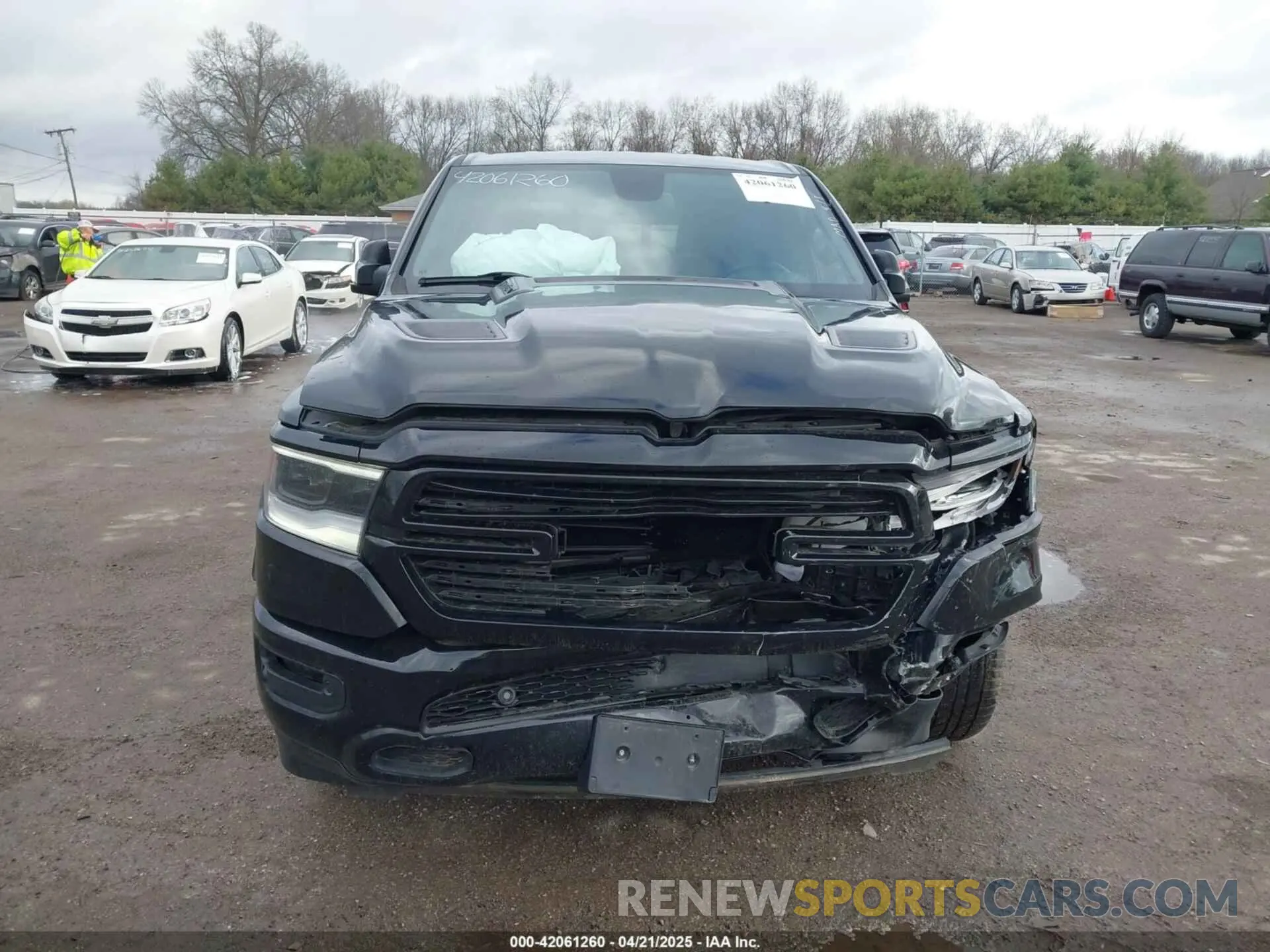 12 Photograph of a damaged car 1C6SRFJTXKN589601 RAM 1500 2019
