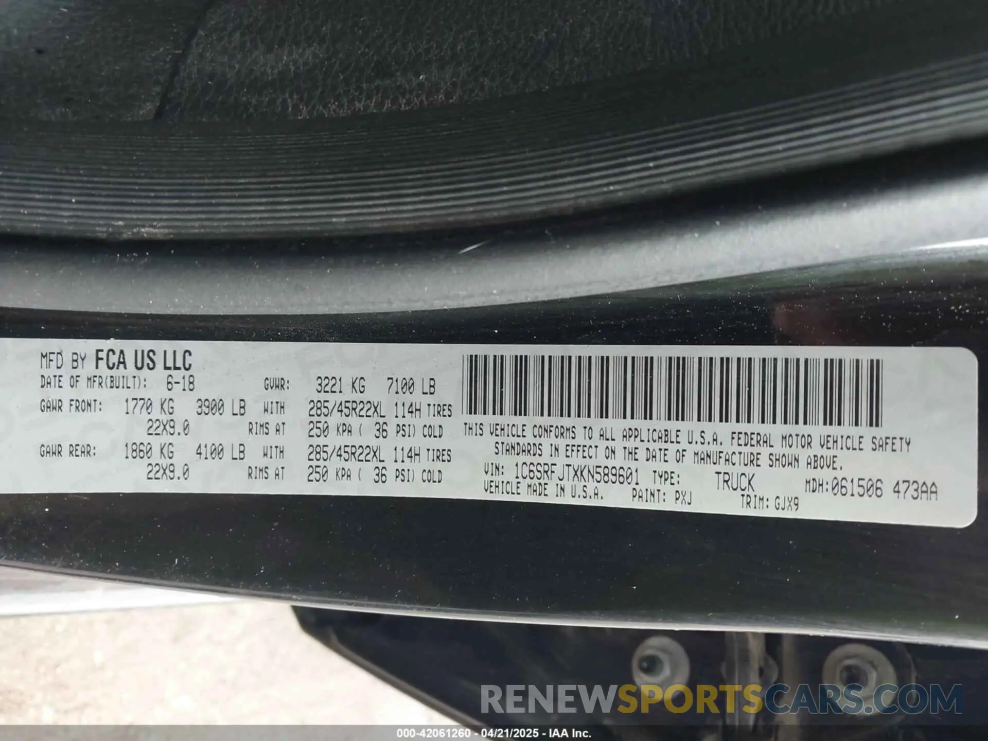 9 Photograph of a damaged car 1C6SRFJTXKN589601 RAM 1500 2019