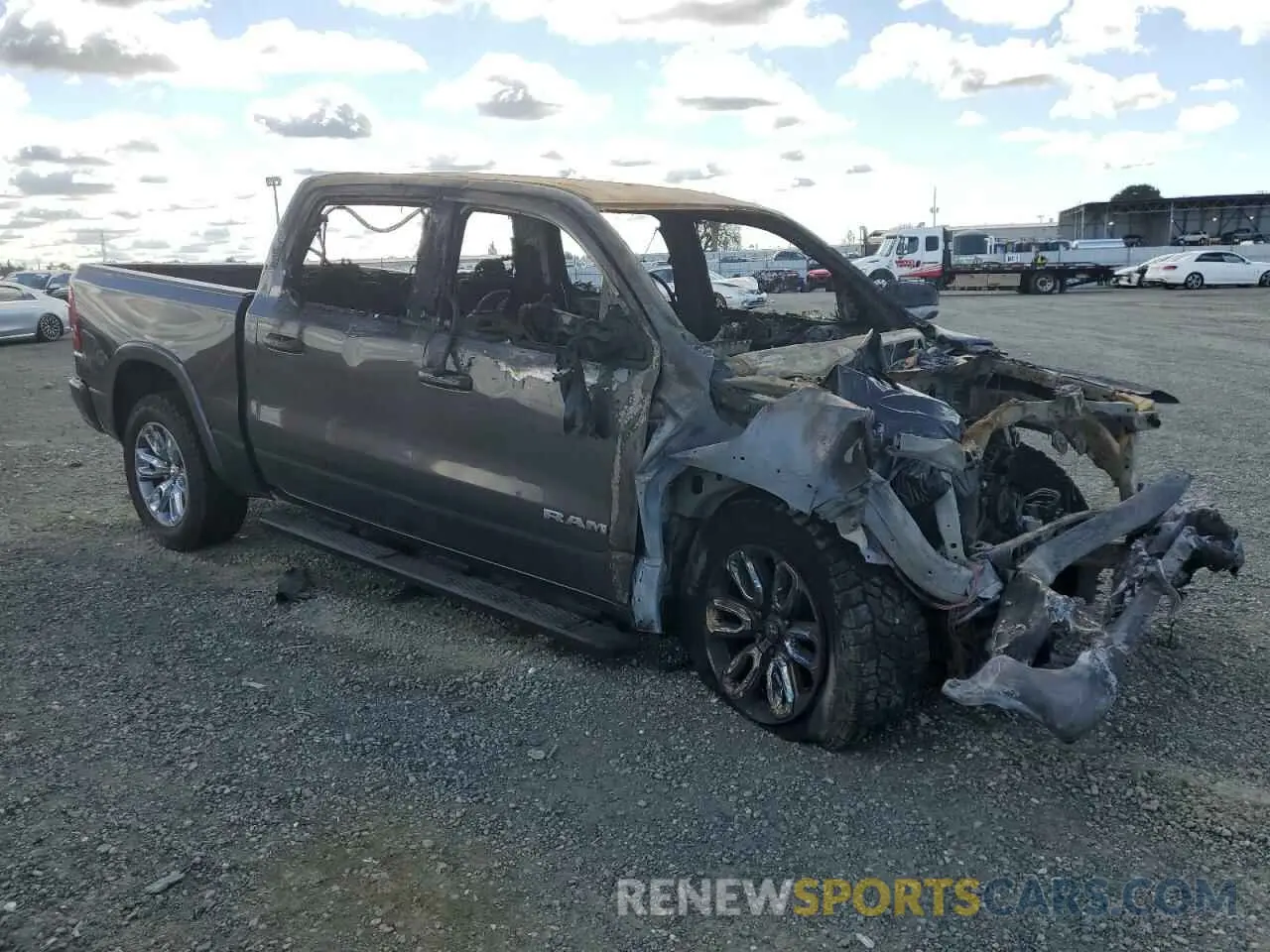 4 Photograph of a damaged car 1C6SRFJTXKN910729 RAM 1500 2019