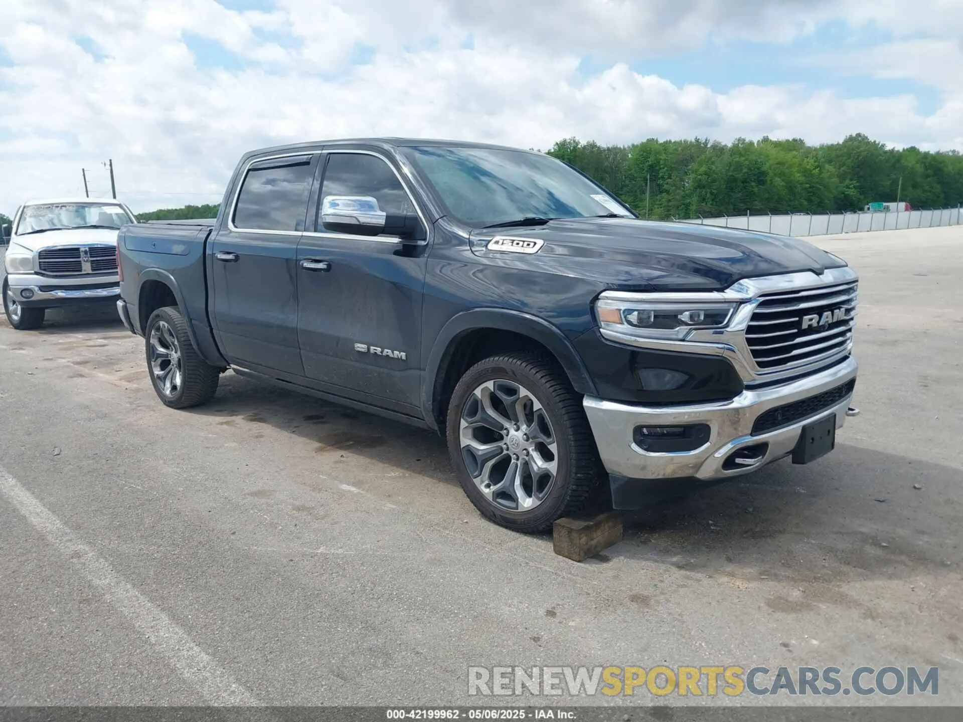 1 Photograph of a damaged car 1C6SRFKT1KN907667 RAM 1500 2019